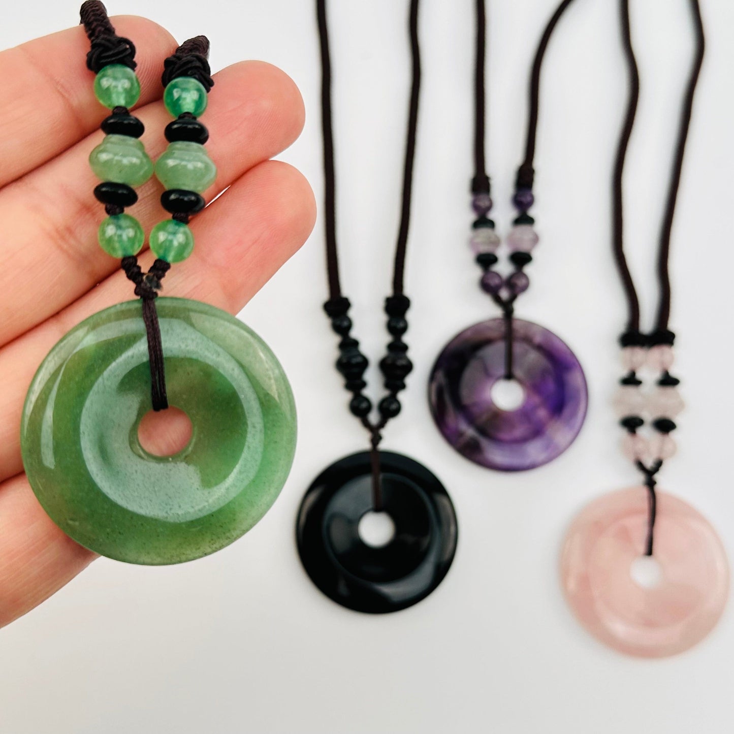 close up of the details on these crystal necklaces 