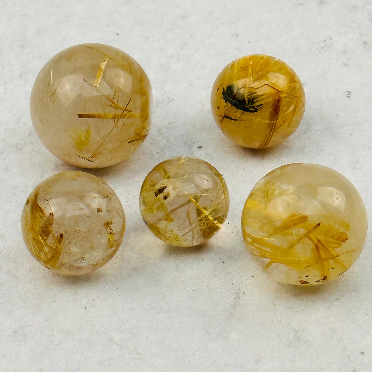 close up of the rutile details on these spheres
