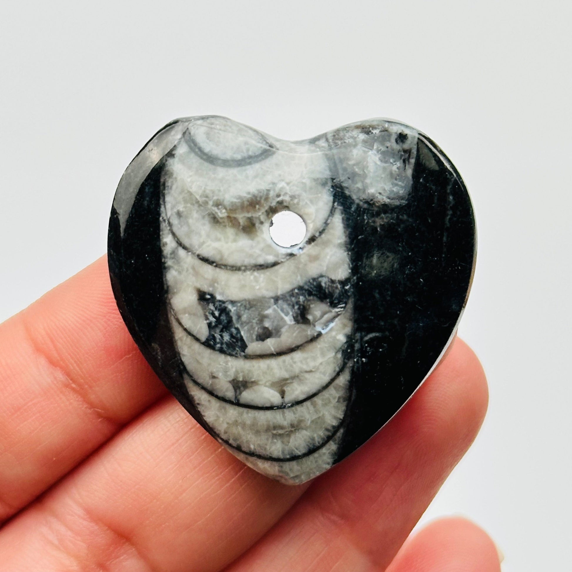close up of the drilled hole on this bead