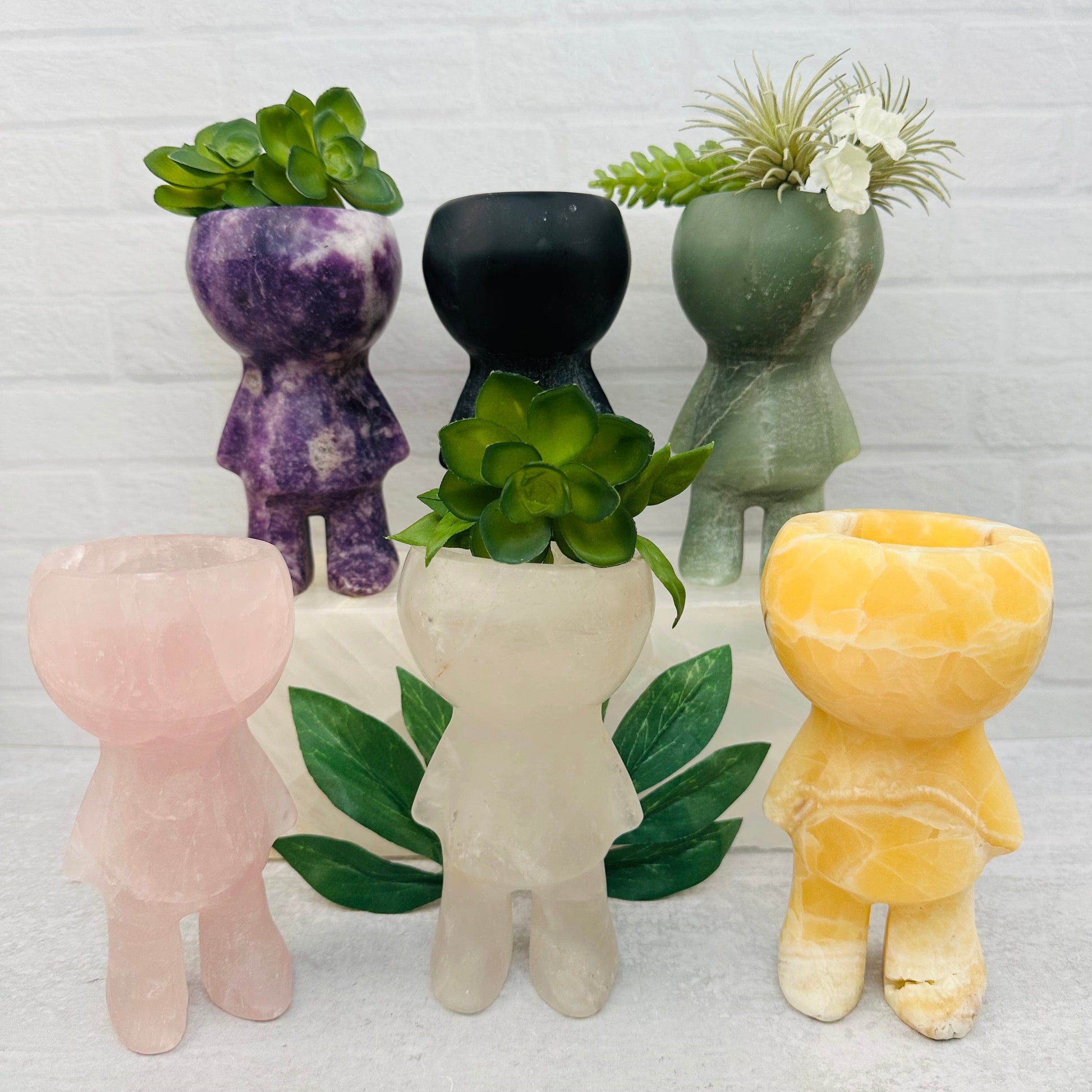Carved Gemstone Plant Person displayed as home decor 