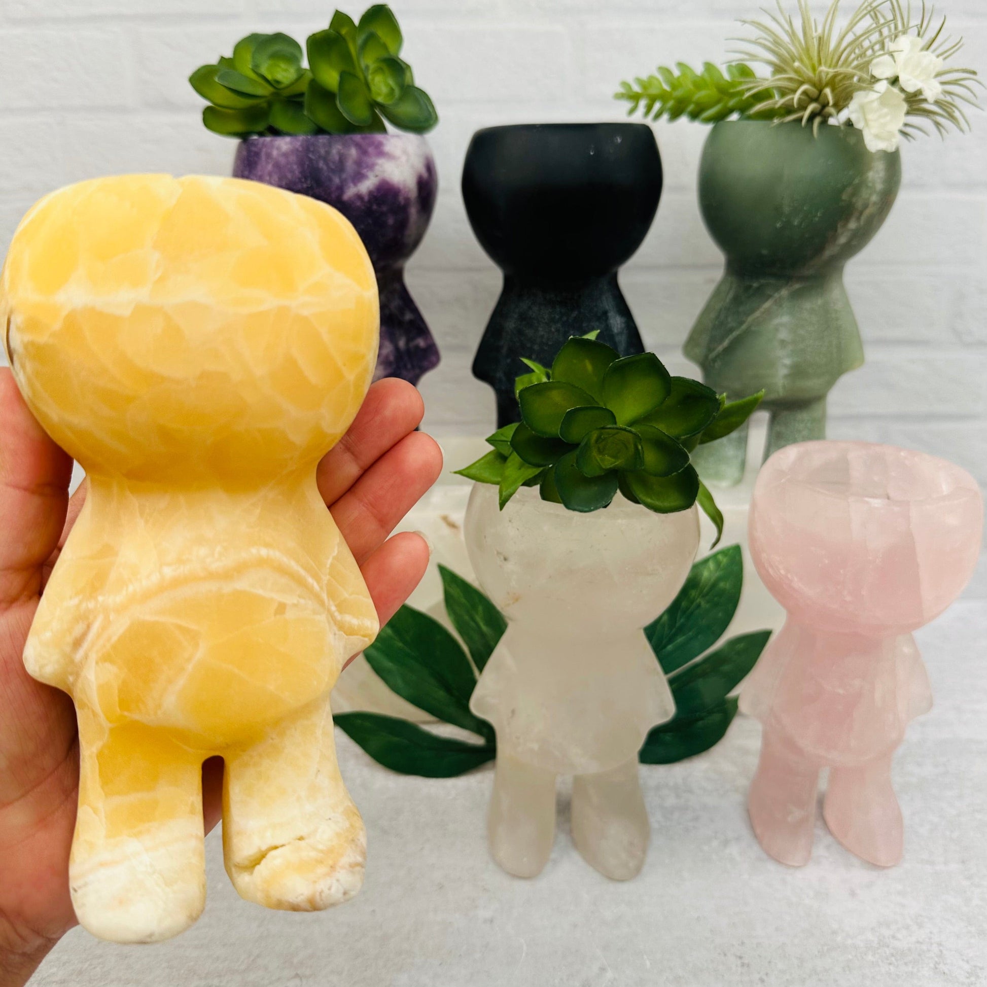 crystal plant people can be used as succulent holders 