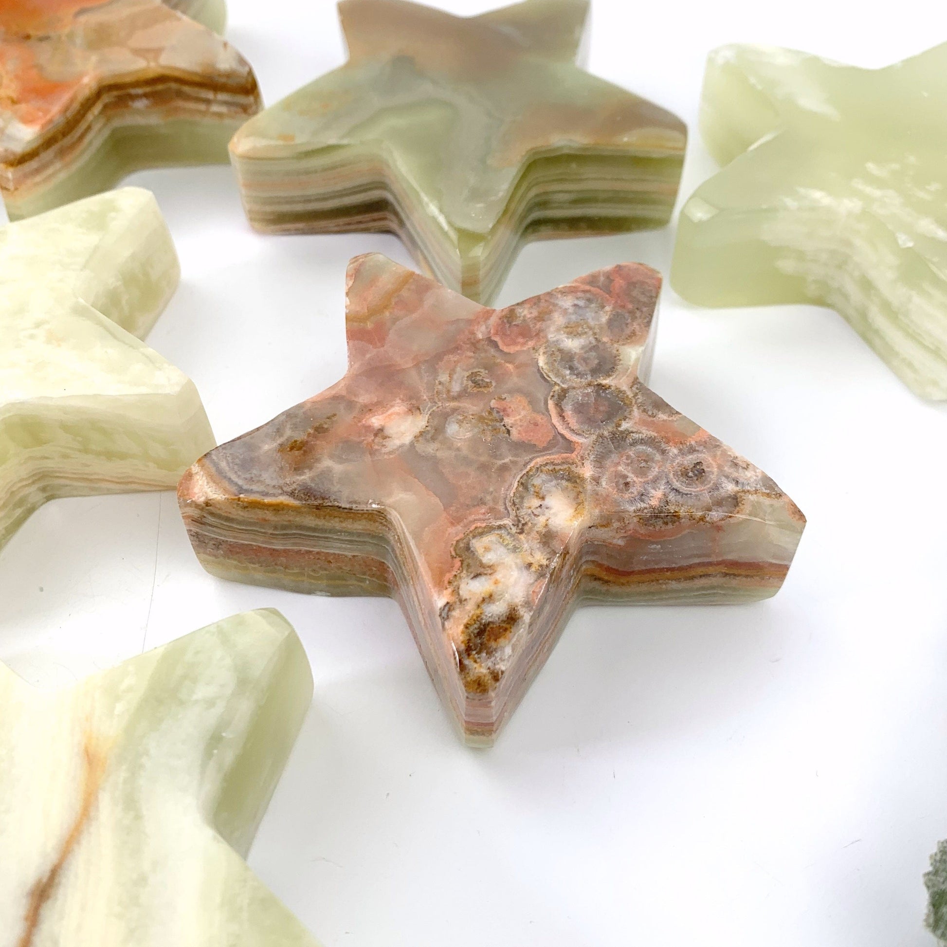 close up of single star on white background side view for thickness reference