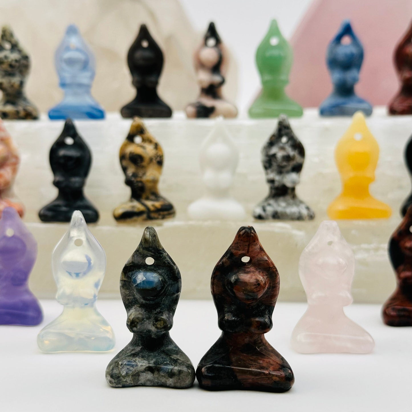 multiple yoga goddess crystals displayed to show the differences in the crystal types