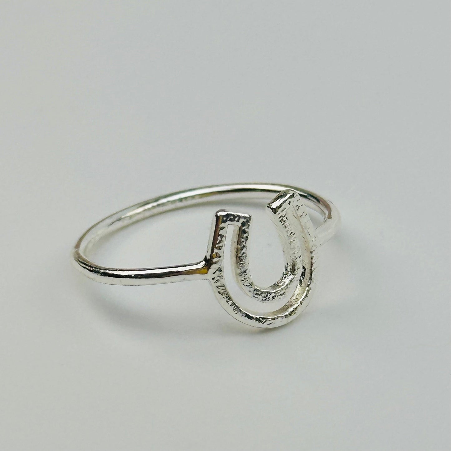 close up of the details on these horse show rings. available in silver tone