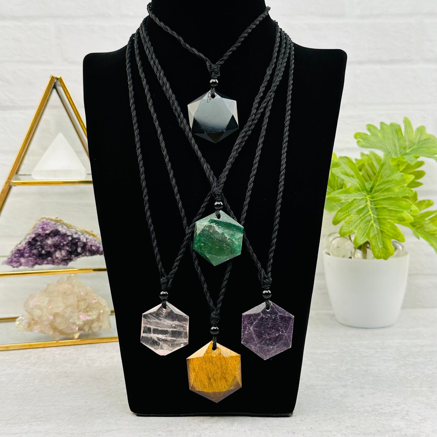 necklaces displayed to show how they hang 
