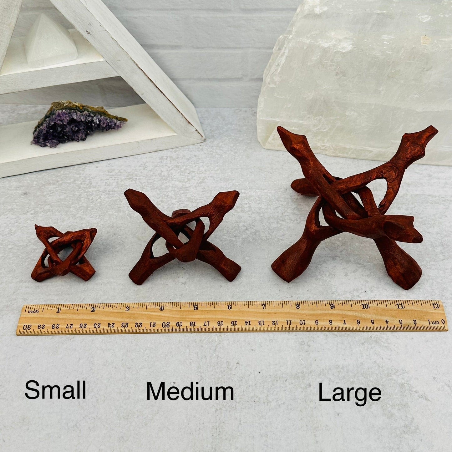 Wood Cobra Sphere Stand next to a ruler for size reference 