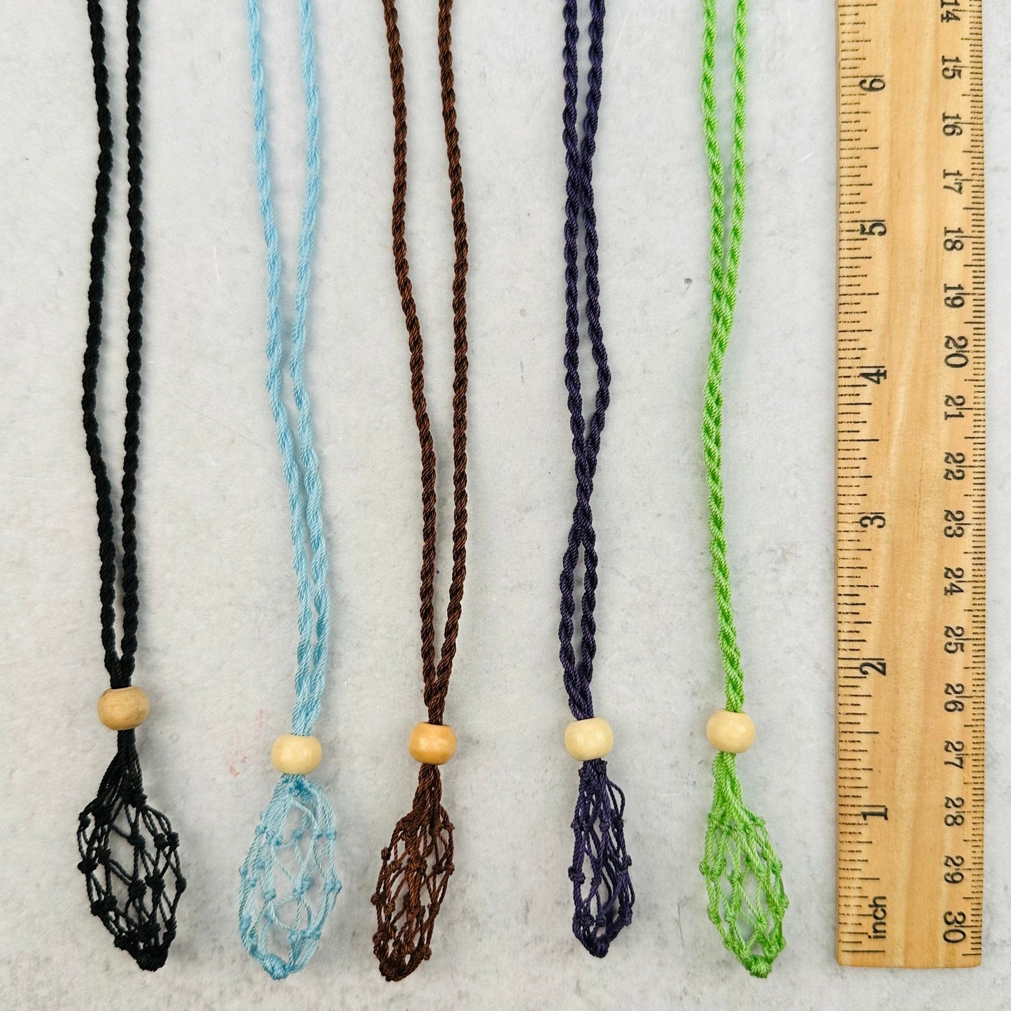 netting pouch next to a ruler for size reference 