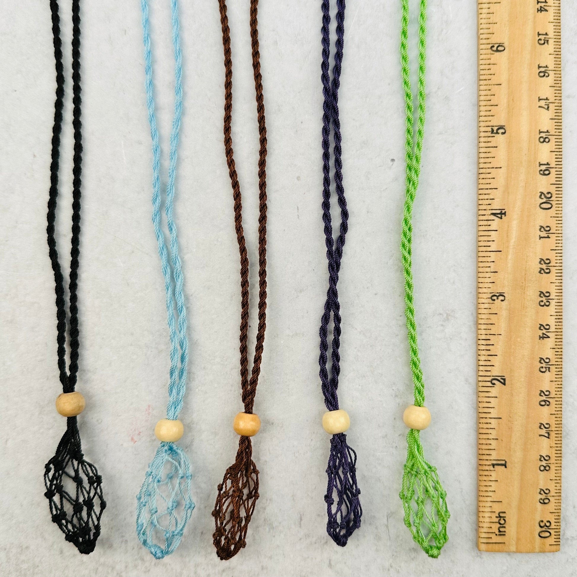 netting pouch next to a ruler for size reference 