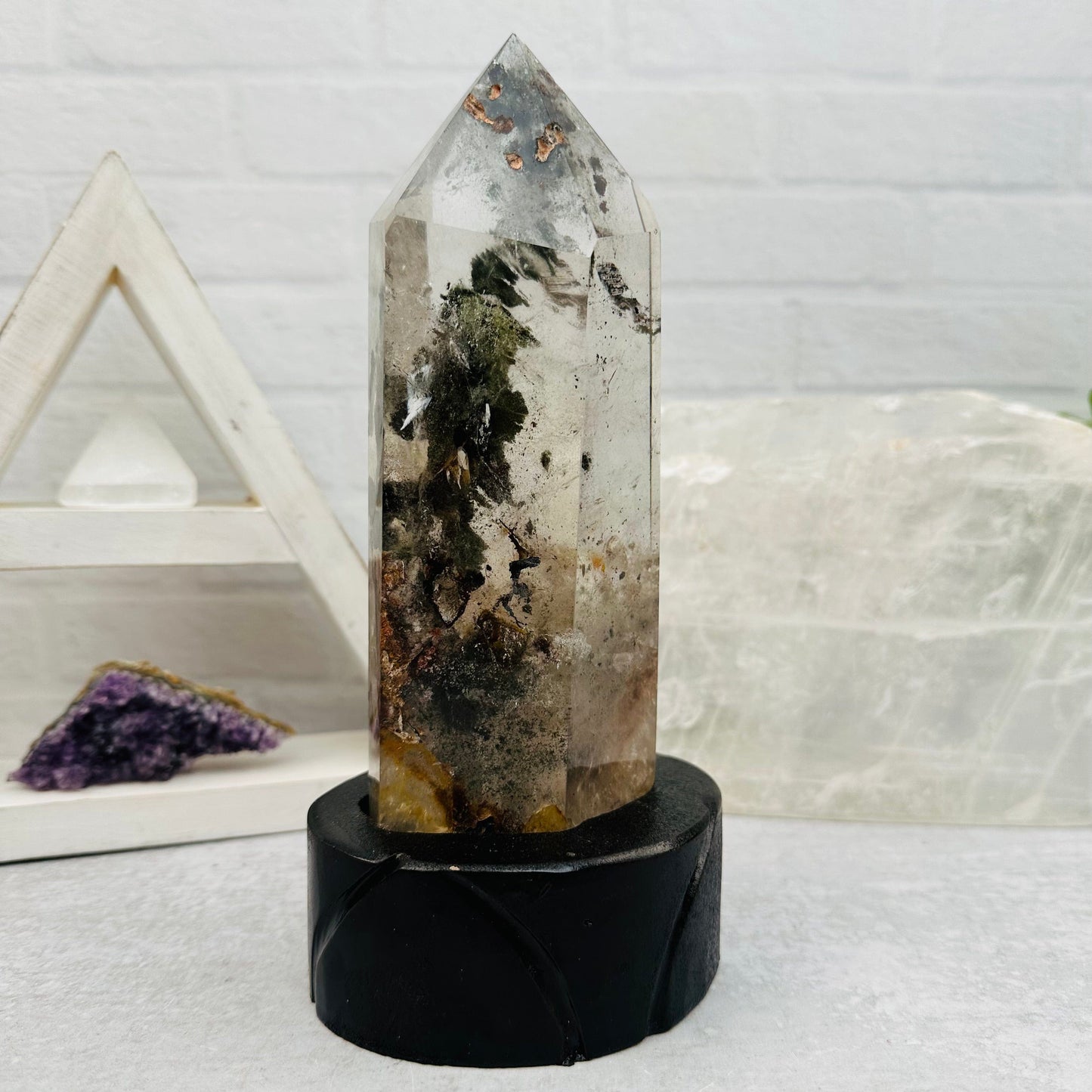  Lodolite Quartz on Wooden Stand displayed as home decor 