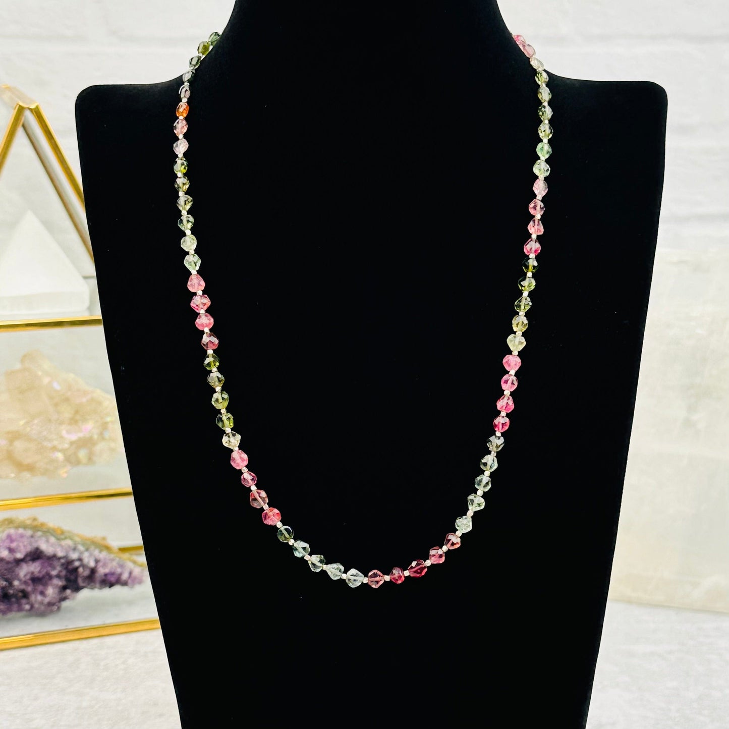 necklace displayed to show how it hangs 