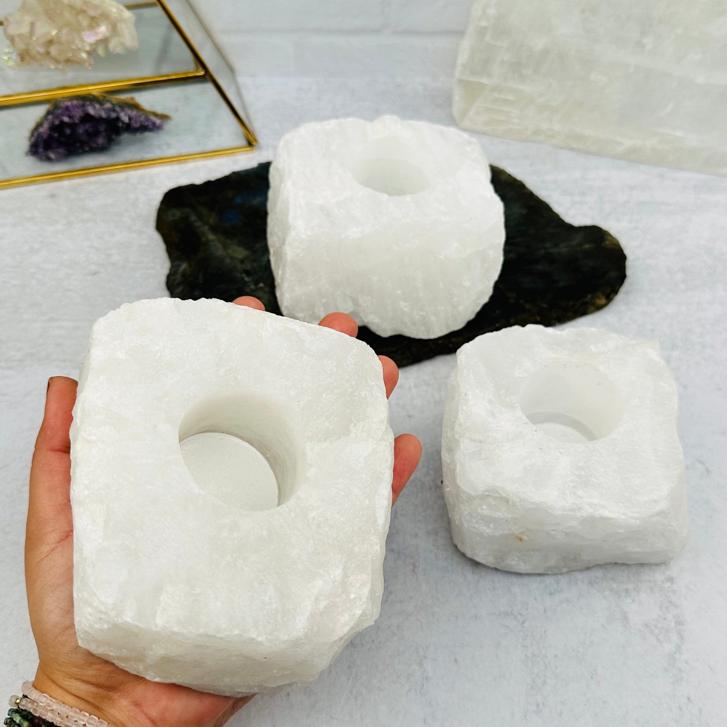 multiple candle holders displayed to show the differences in the sizes 