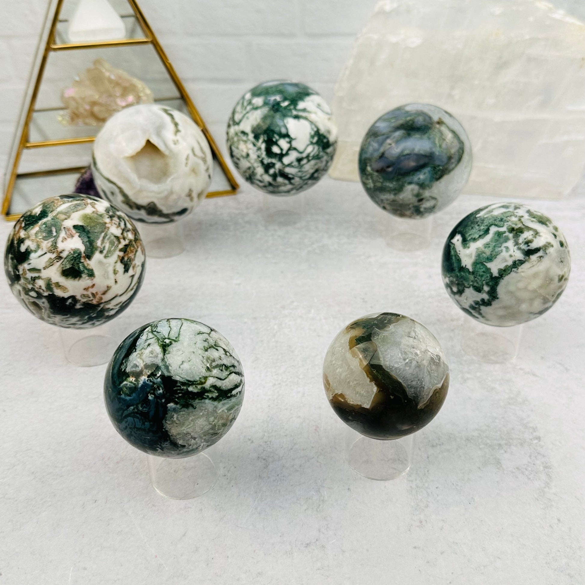 multiple spheres displayed to show the differences in the color shades and sizes 