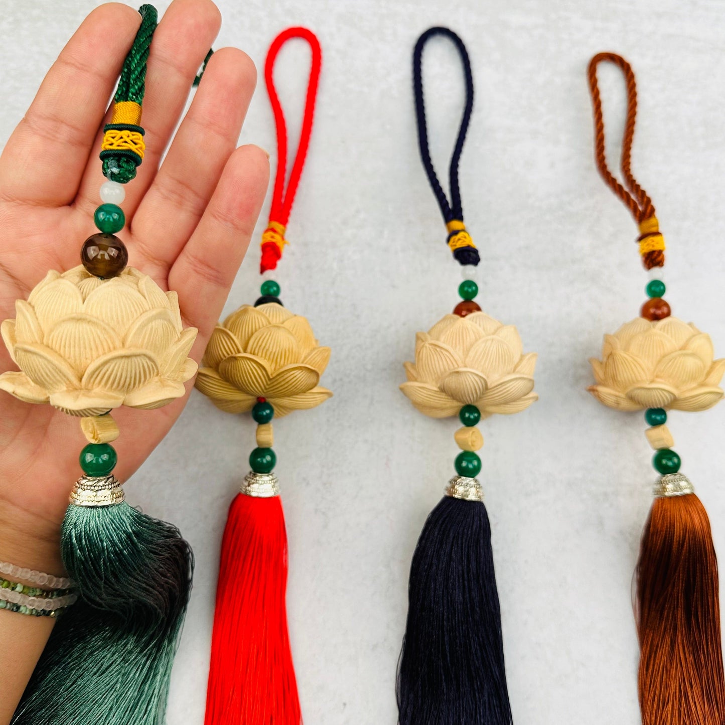 wooden lotus flower tassel with decorations in the background