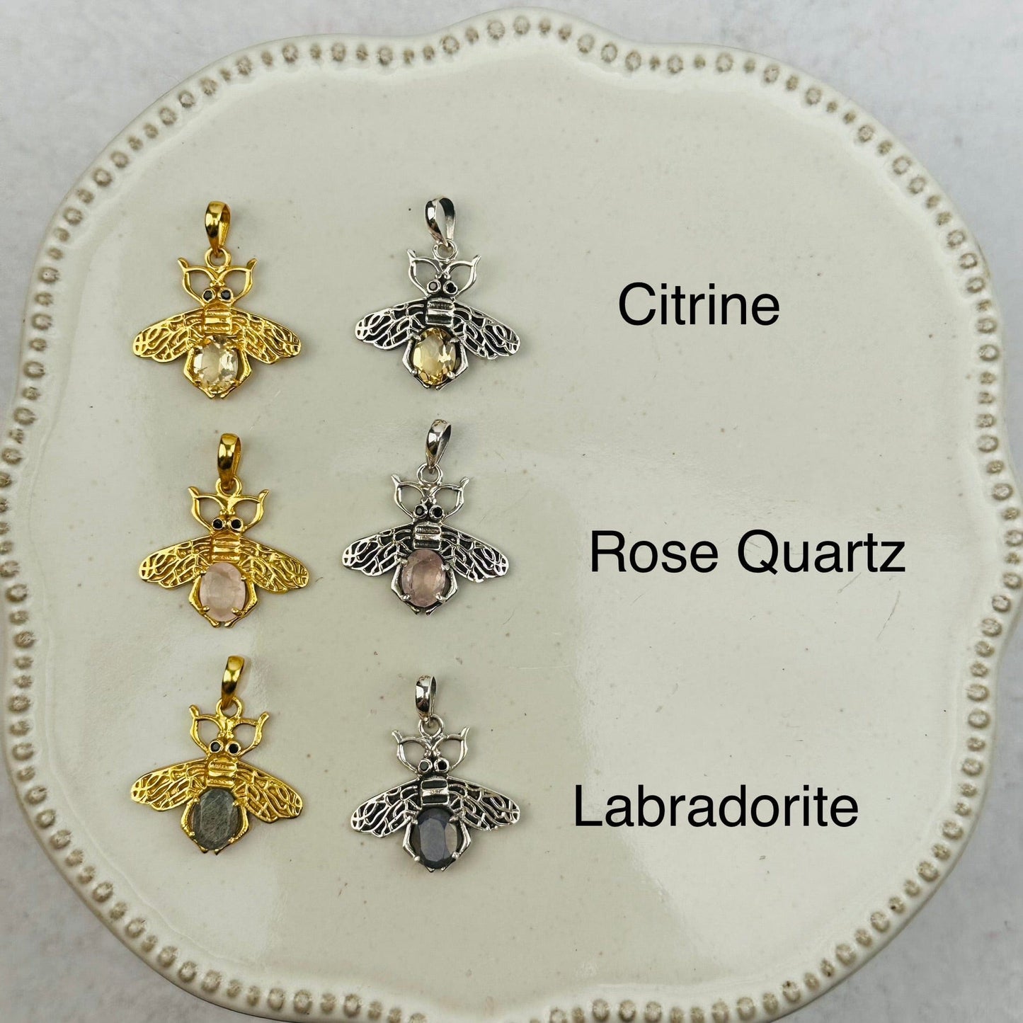 crystal bee pendants with decorations in the background