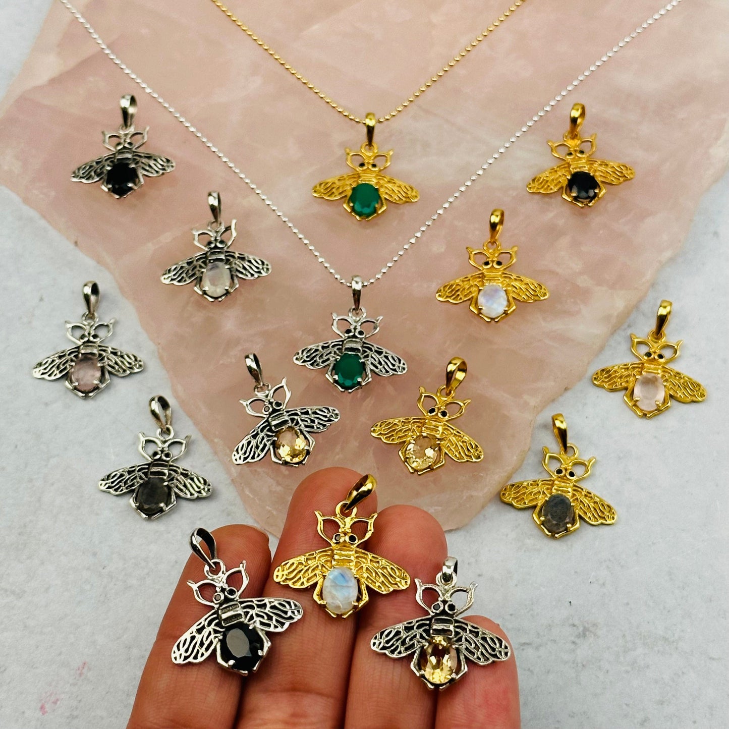 crystal bee pendants with decorations in the background
