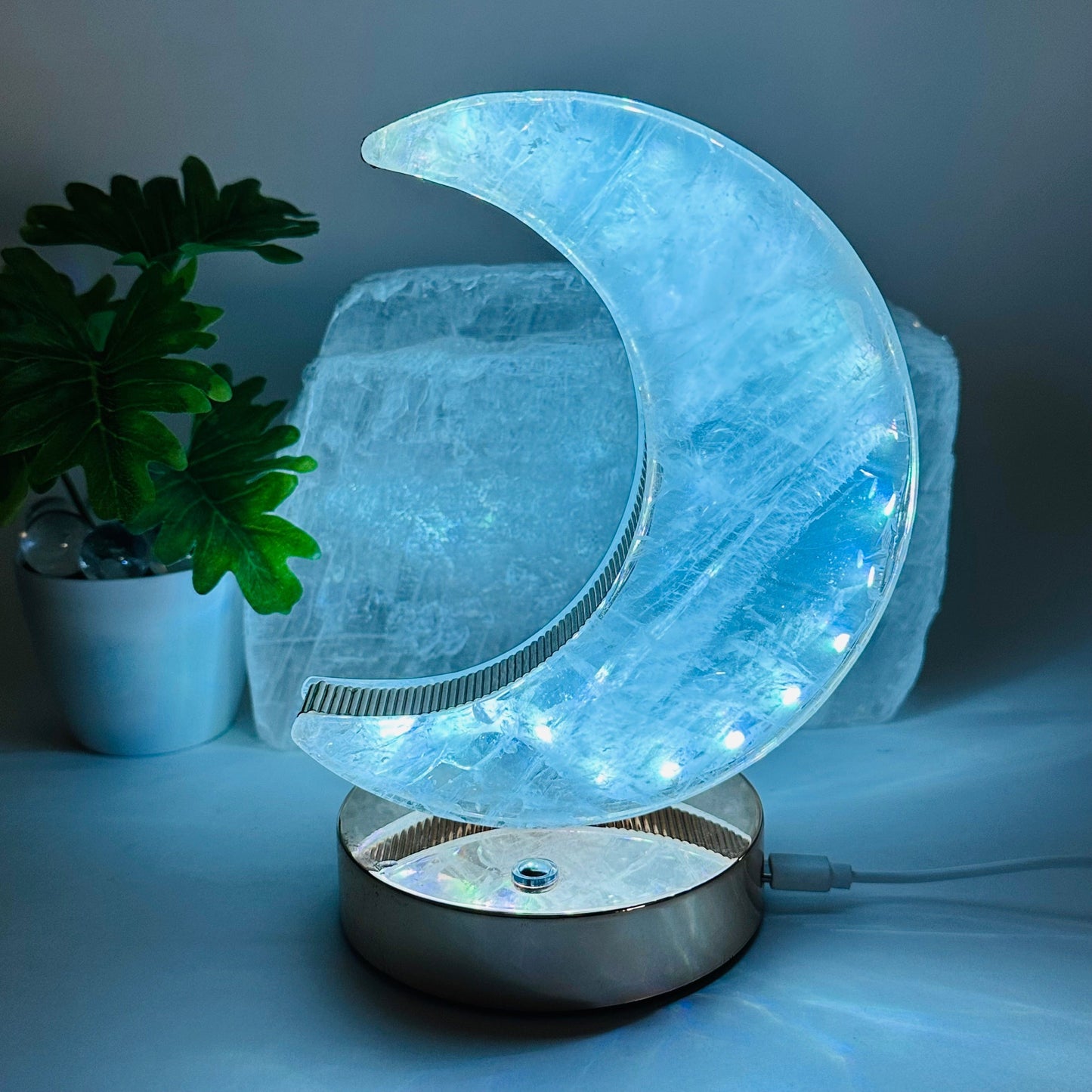 crystal quartz moon lamp displayed as home decor 