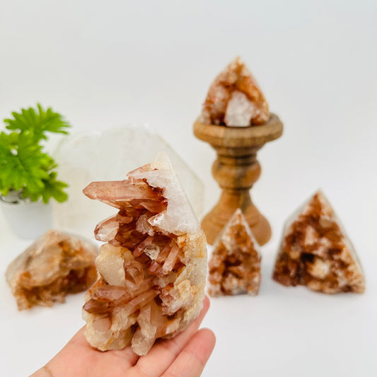 Tangerine Quartz Cluster Semi Polished Point in hand for size reference 