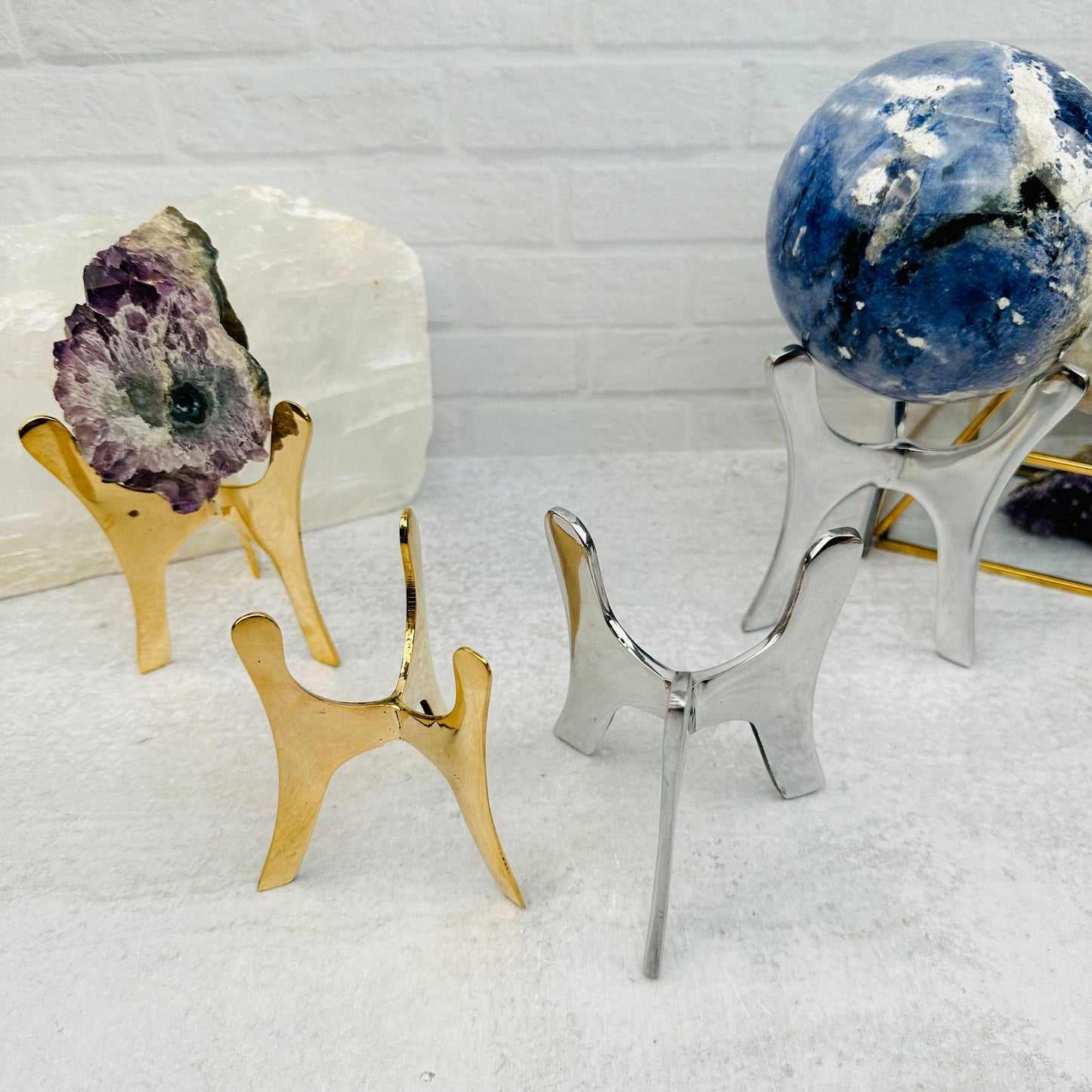 Crystal Tripod Stand comes in silver or gold 