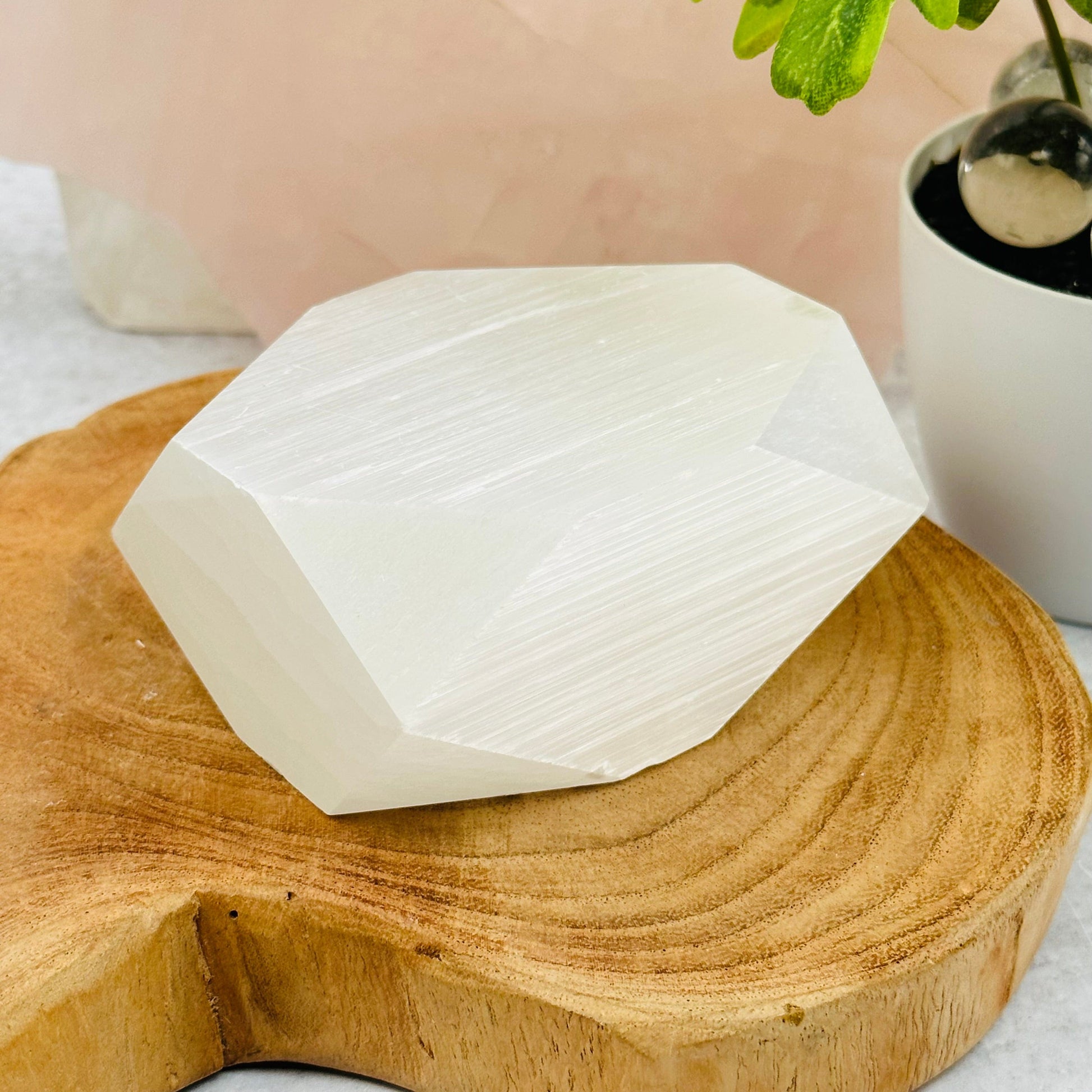 Selenite - Tumbled Polygon Shape displayed as home decor 