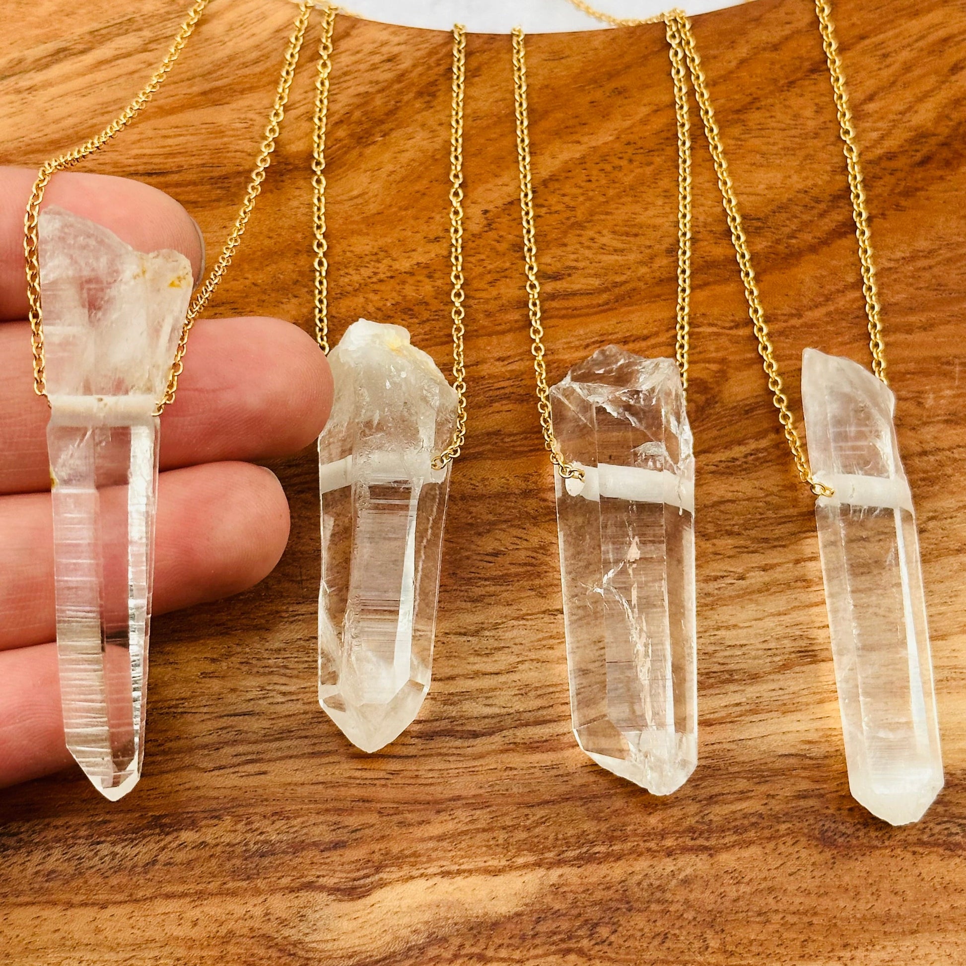 Columbian Lemurian Point Crystal in hand for size reference 