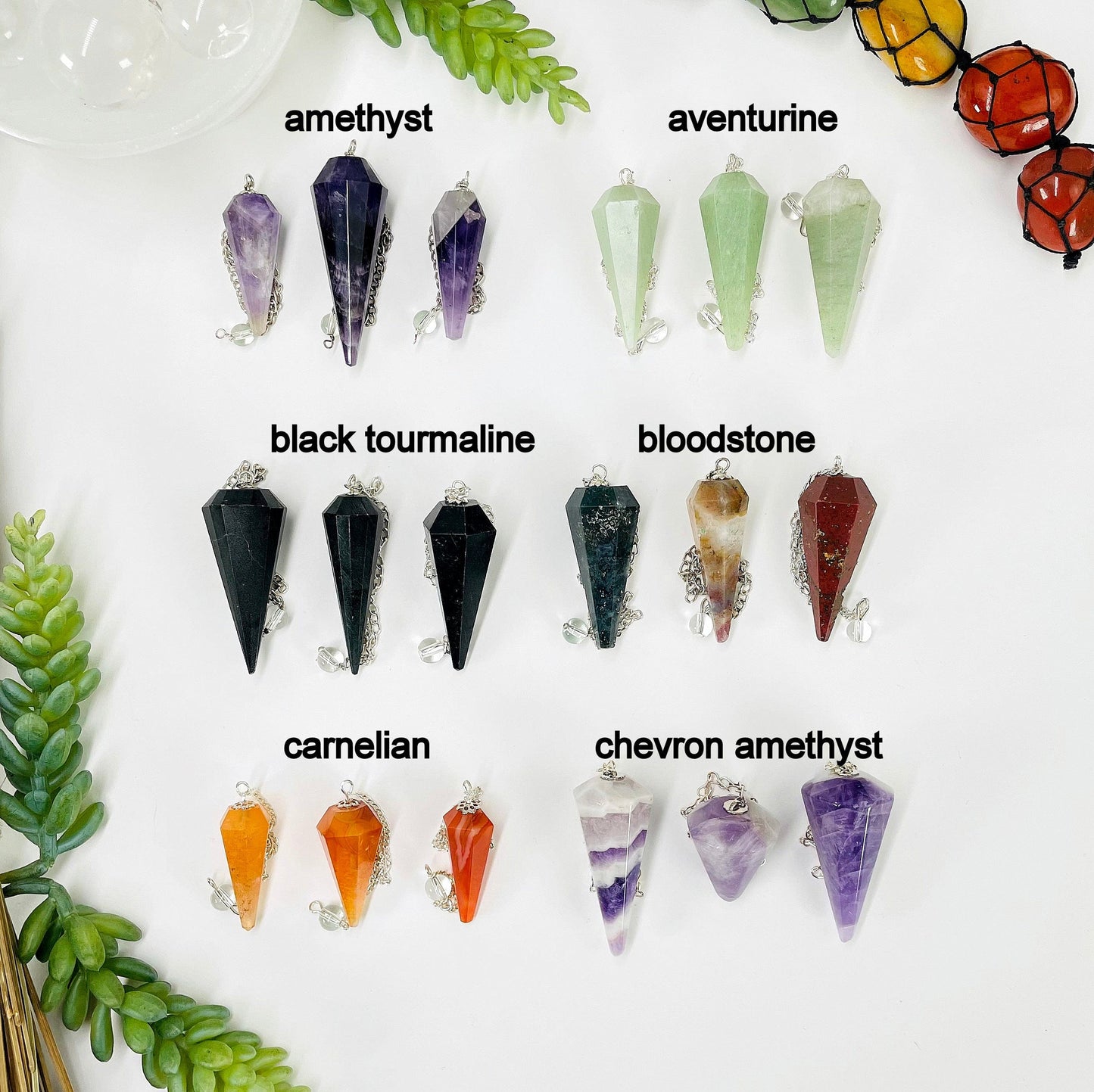 three amethyst, aventurine, black tourmaline, bloodstone, carnelian, and chevron amethyst pendulum pendants on whit background for possible variations