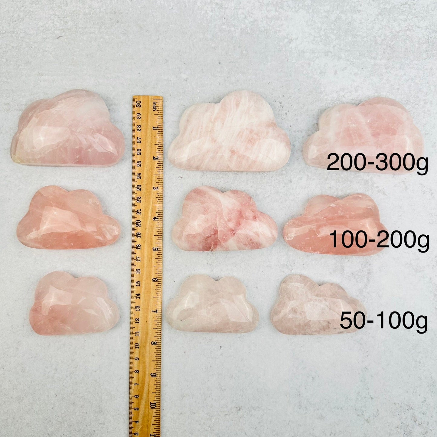 Rose Quartz Crystal Clouds - Crystal Decor - By Weight next to a ruler for size reference 