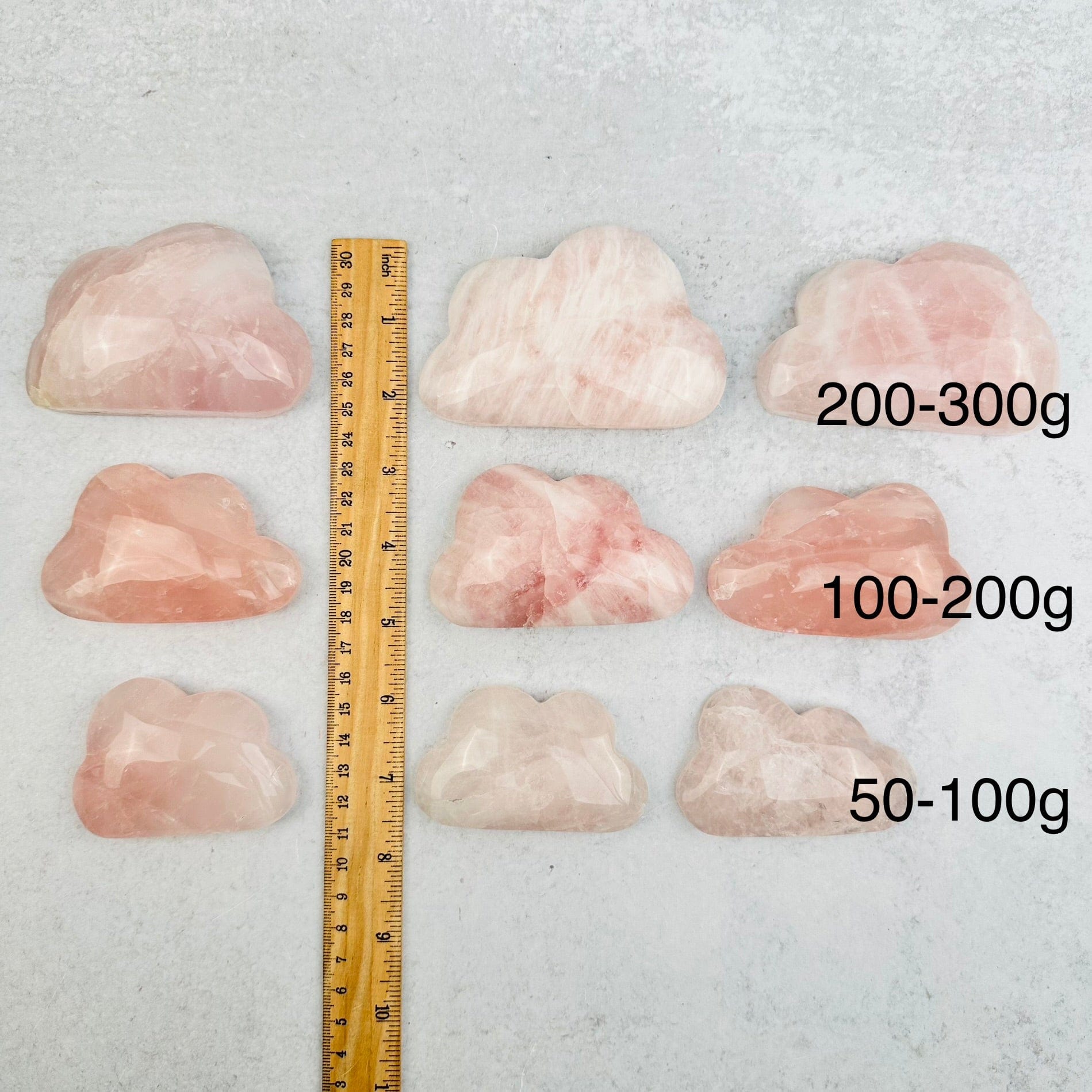 Rose Quartz Crystal Clouds - Crystal Decor - By Weight next to a ruler for size reference 