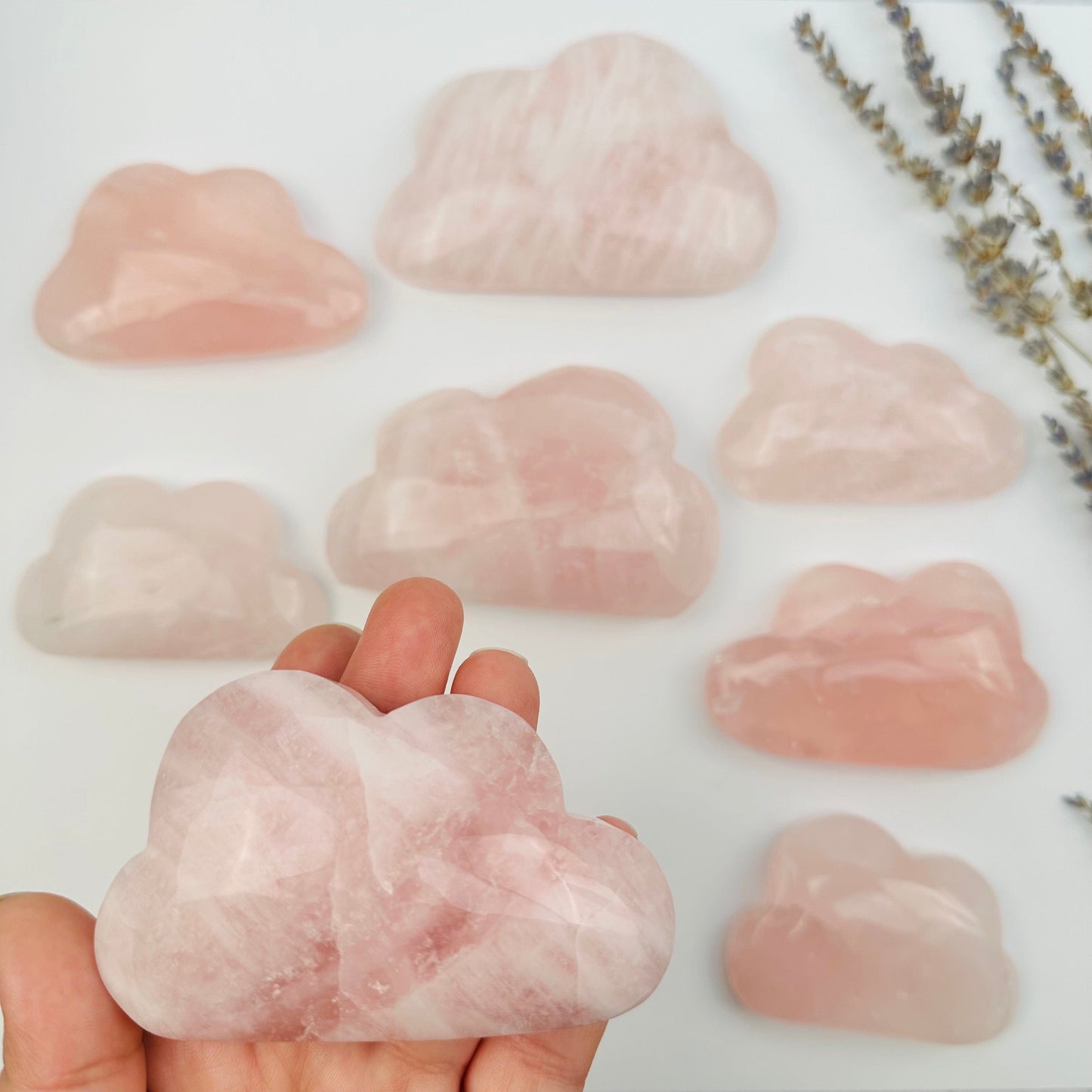 Rose Quartz Crystal Cloud in hand for size reference 