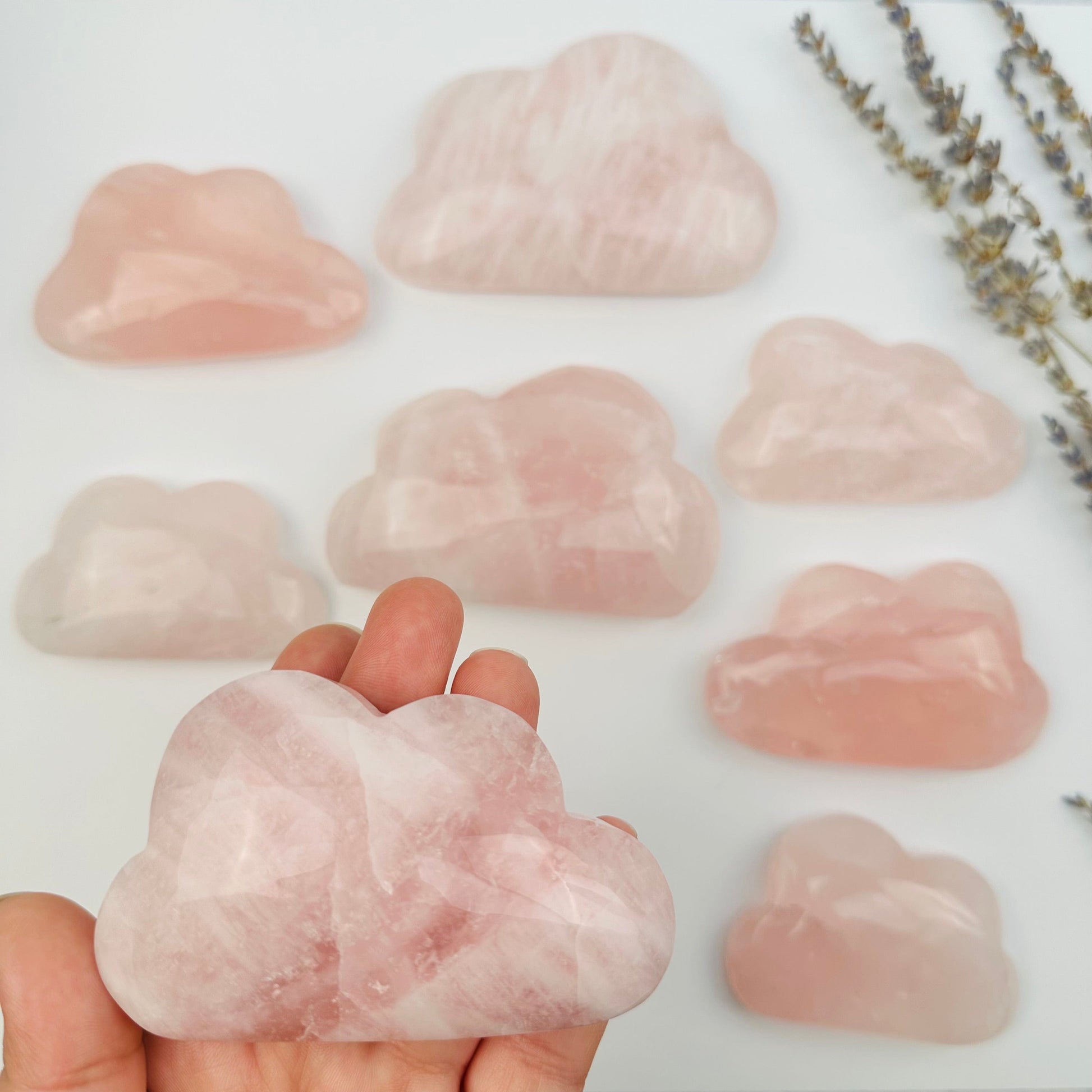 Rose Quartz Crystal Cloud in hand for size reference 