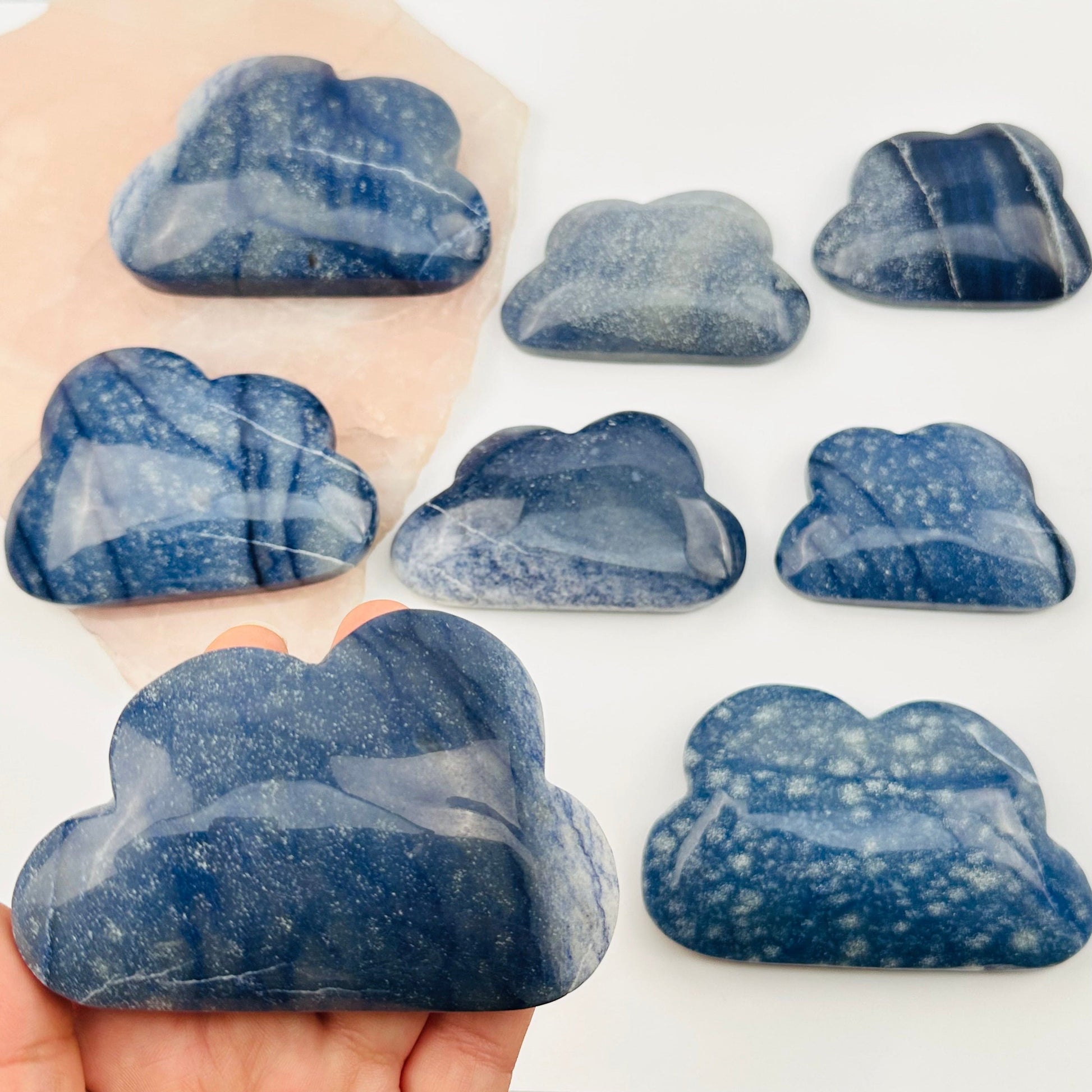 Blue Quartz Crystal Cloud in hand for size reference 