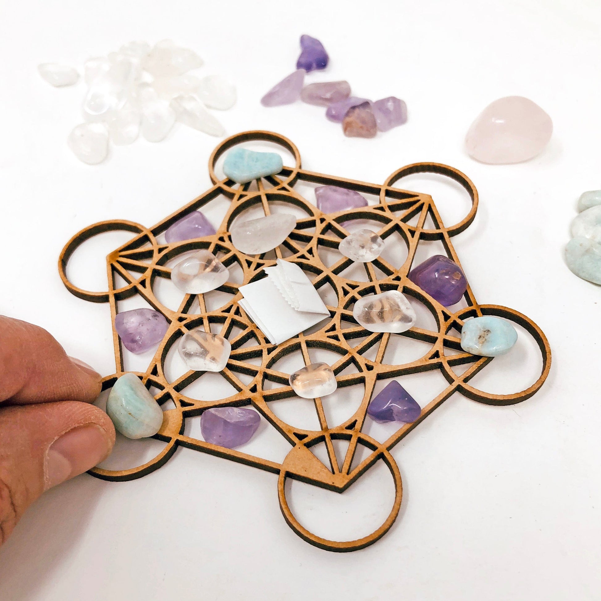 Love Crystal Grid Set showing placing stones on grid