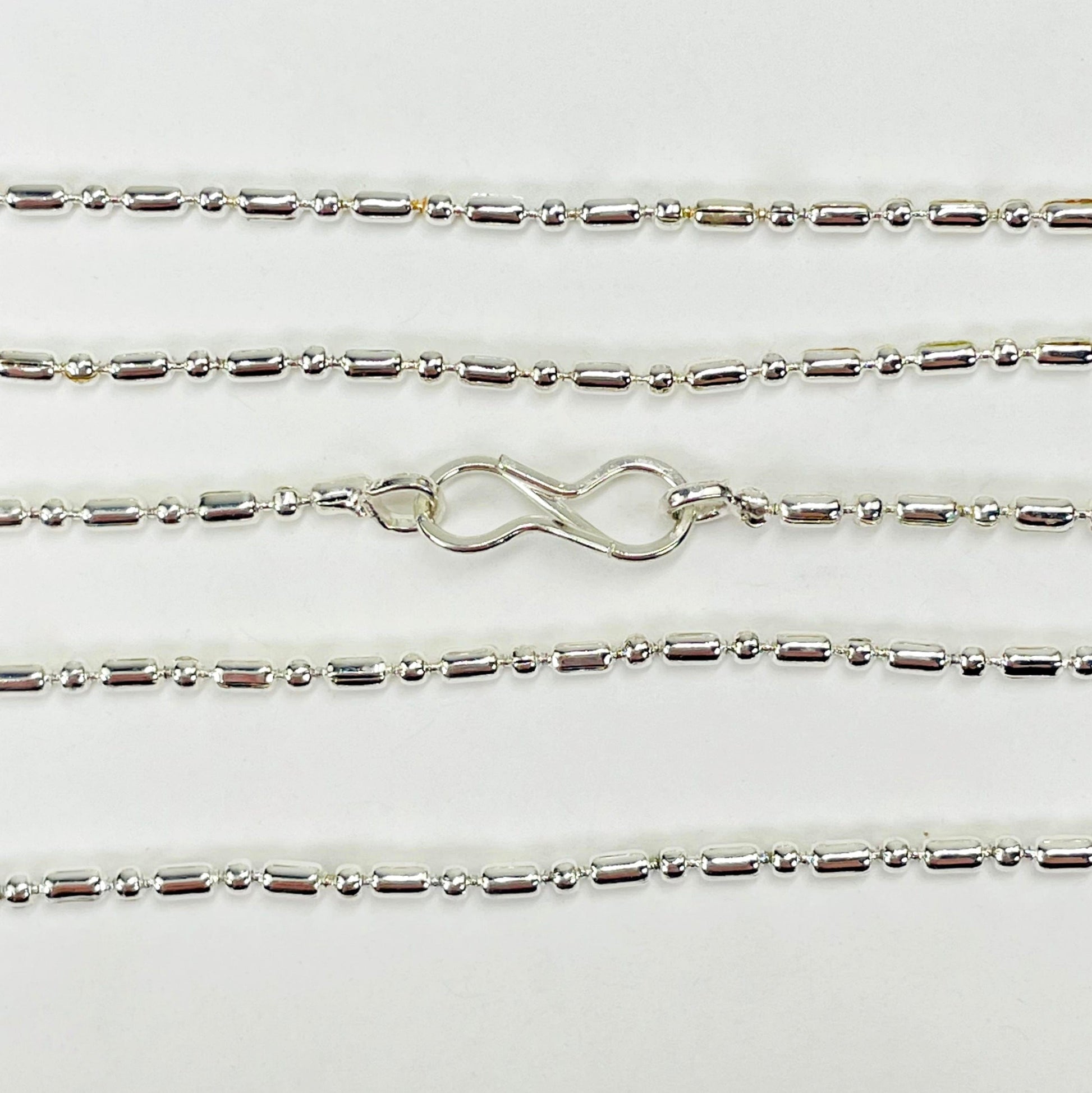 close up of necklace clasp and chain