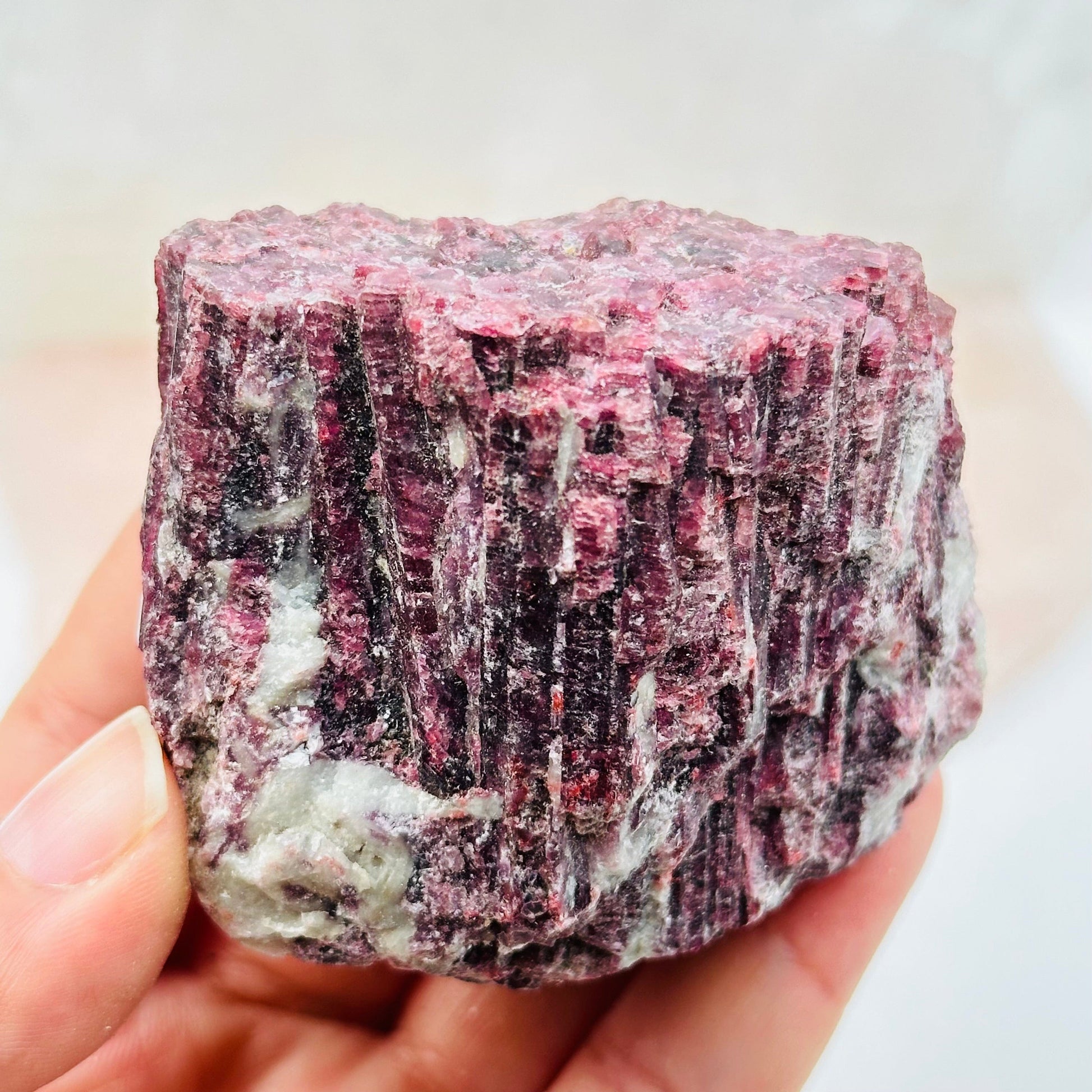 close up of the details on this pink tourmaline crystal cluster 