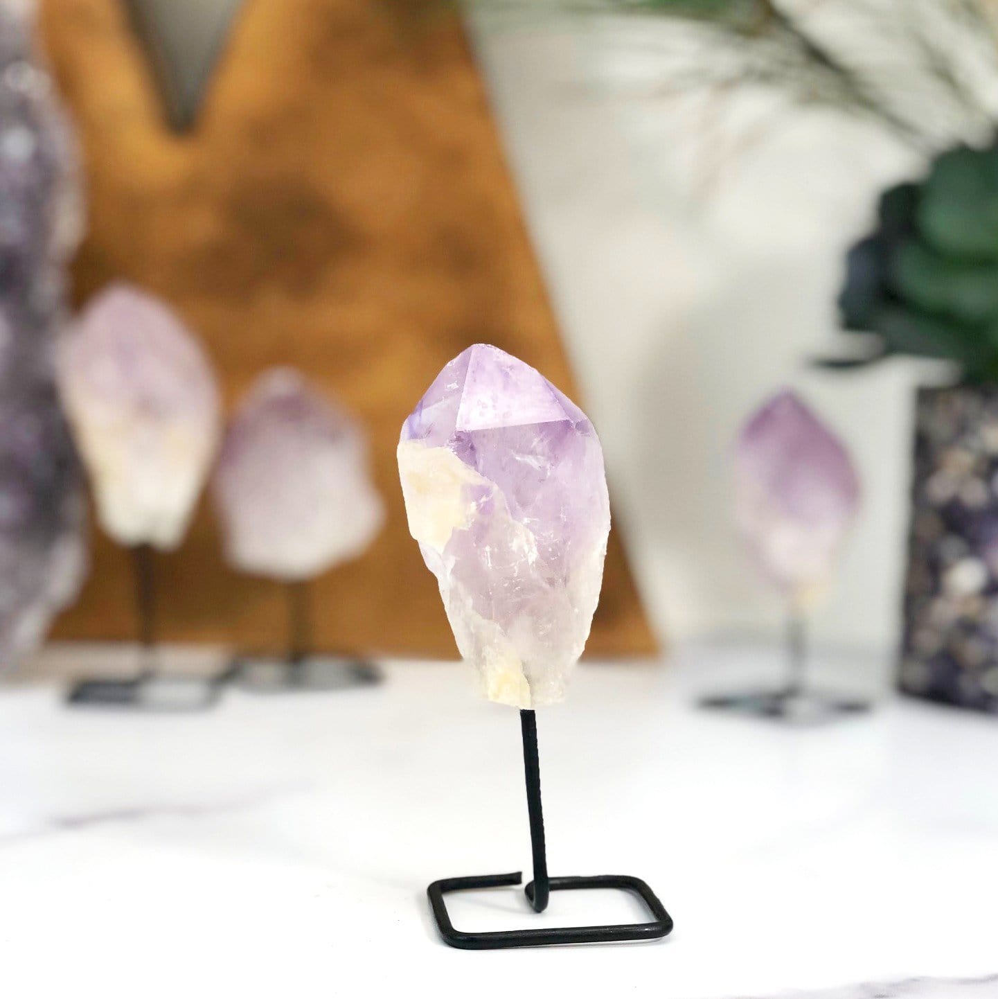 Products Natural Stone Crystal on Metal Stand - close up of one