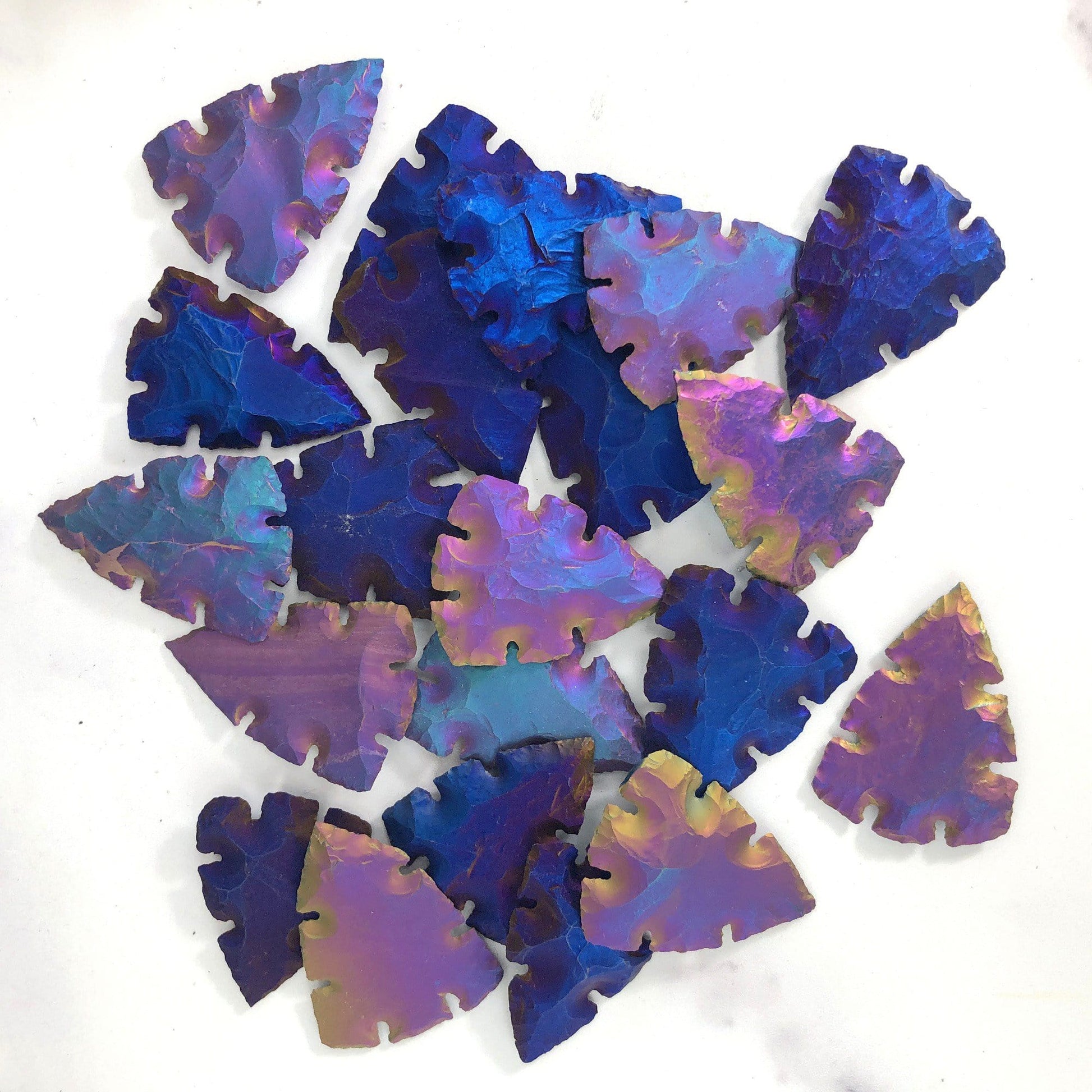 titanium arrowhead in a pile