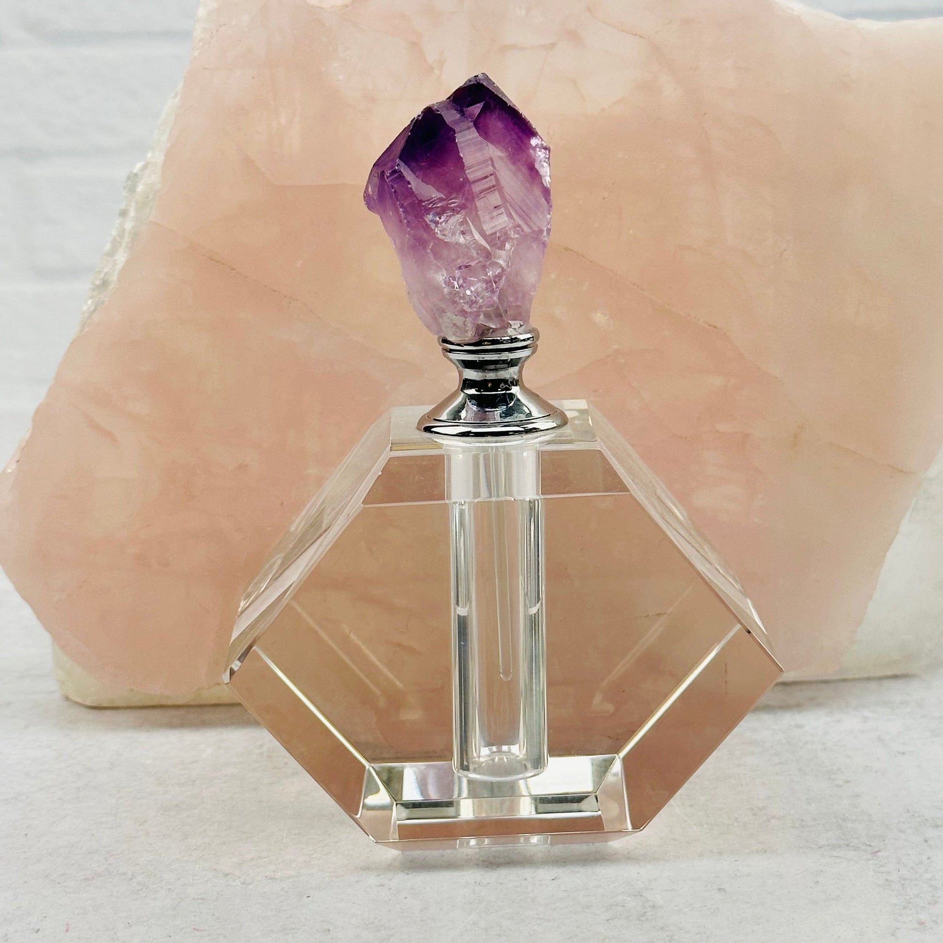 close up of the details on this perfume bottle 