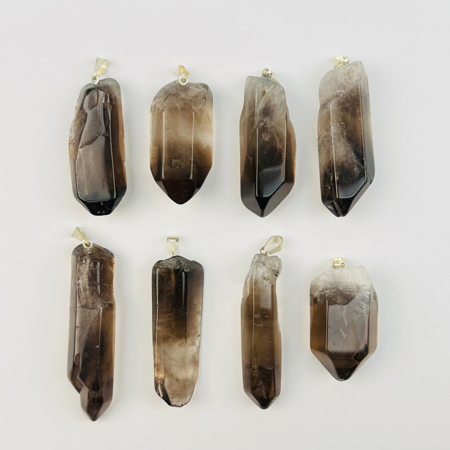multiple pendants displayed to show the differences in the color shades and sizes 
