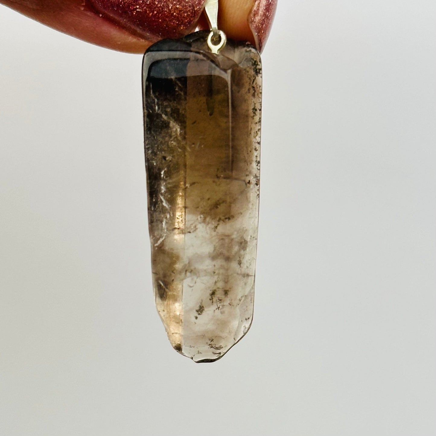 close up of the details on this polished pendant