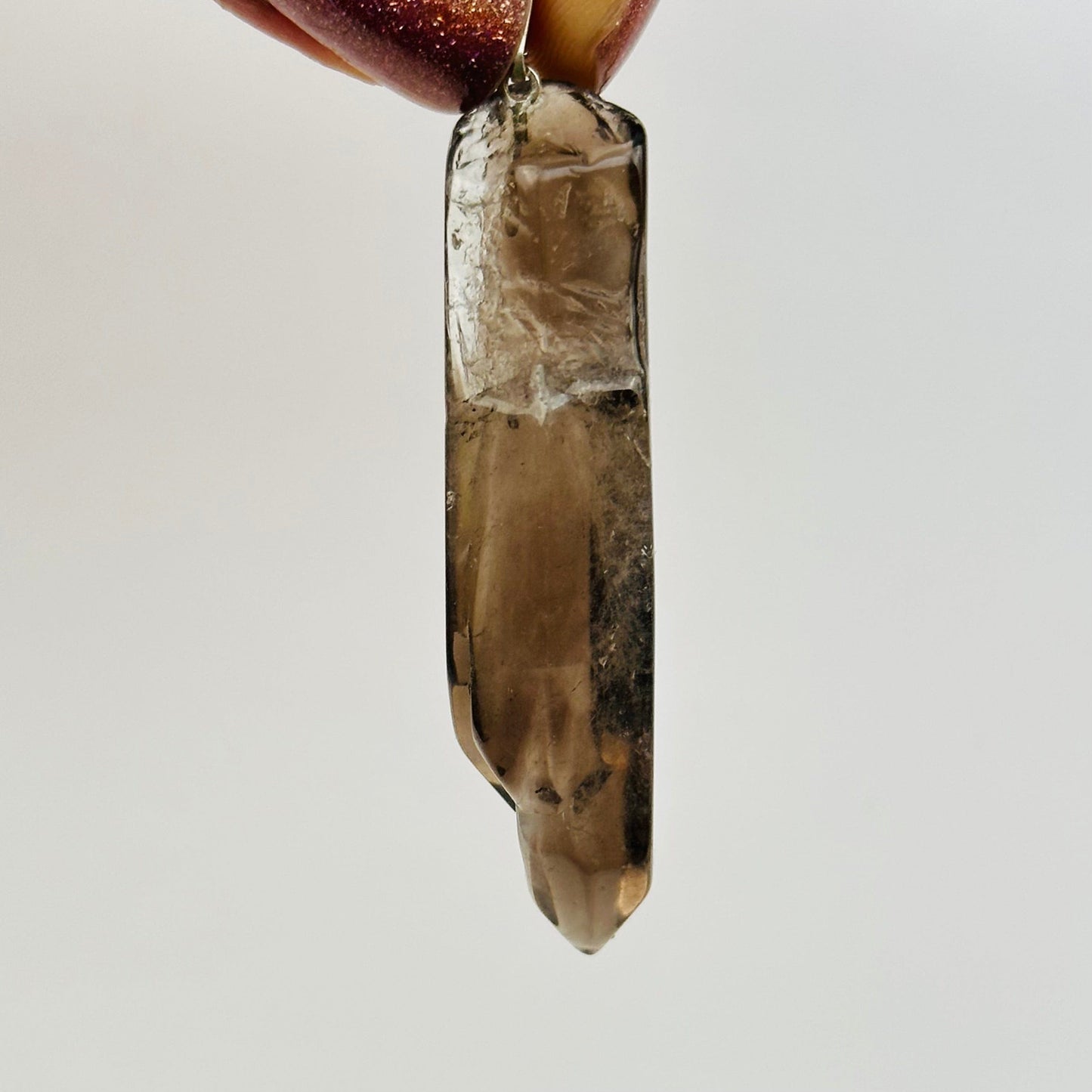 close up of the details on this polished pendant