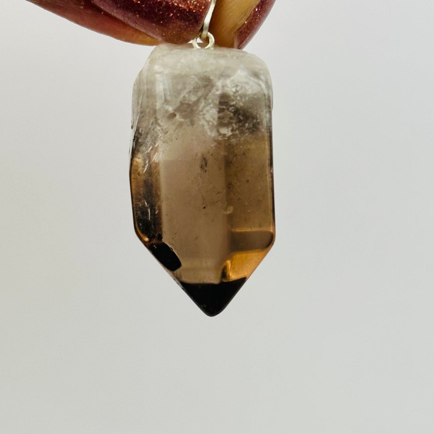 close up of the details on this polished pendant
