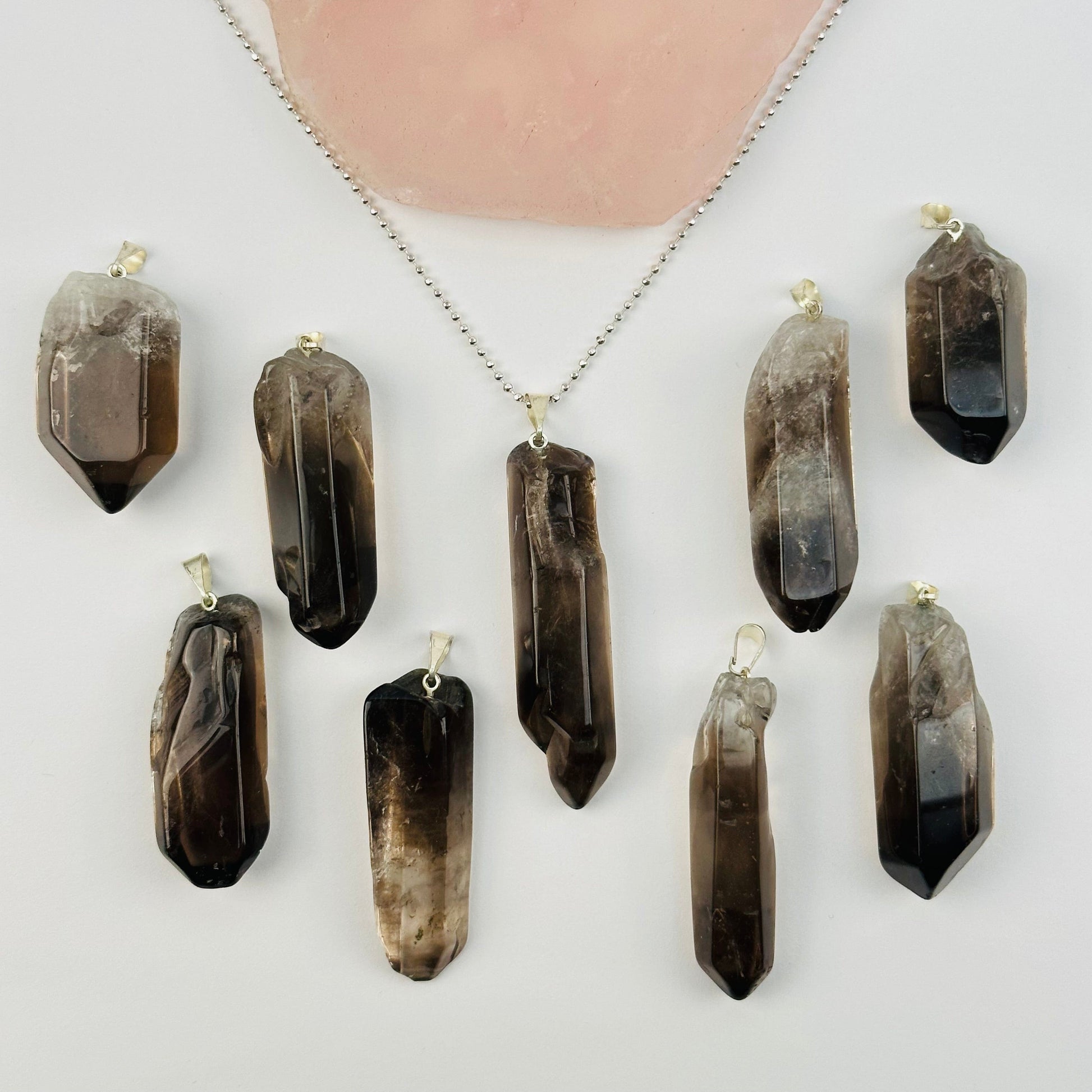 multiple pendants displayed to show the differences in the sizes and color shades 