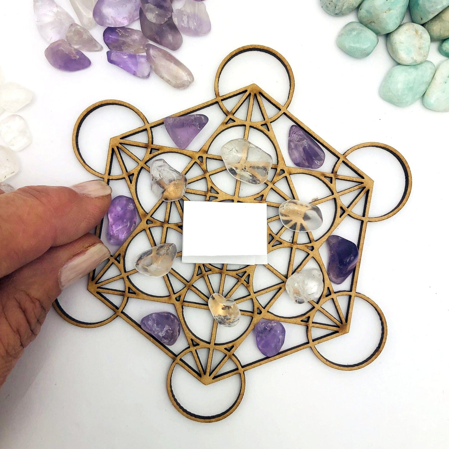 Love Crystal Grid Set showing placing stones on grid
