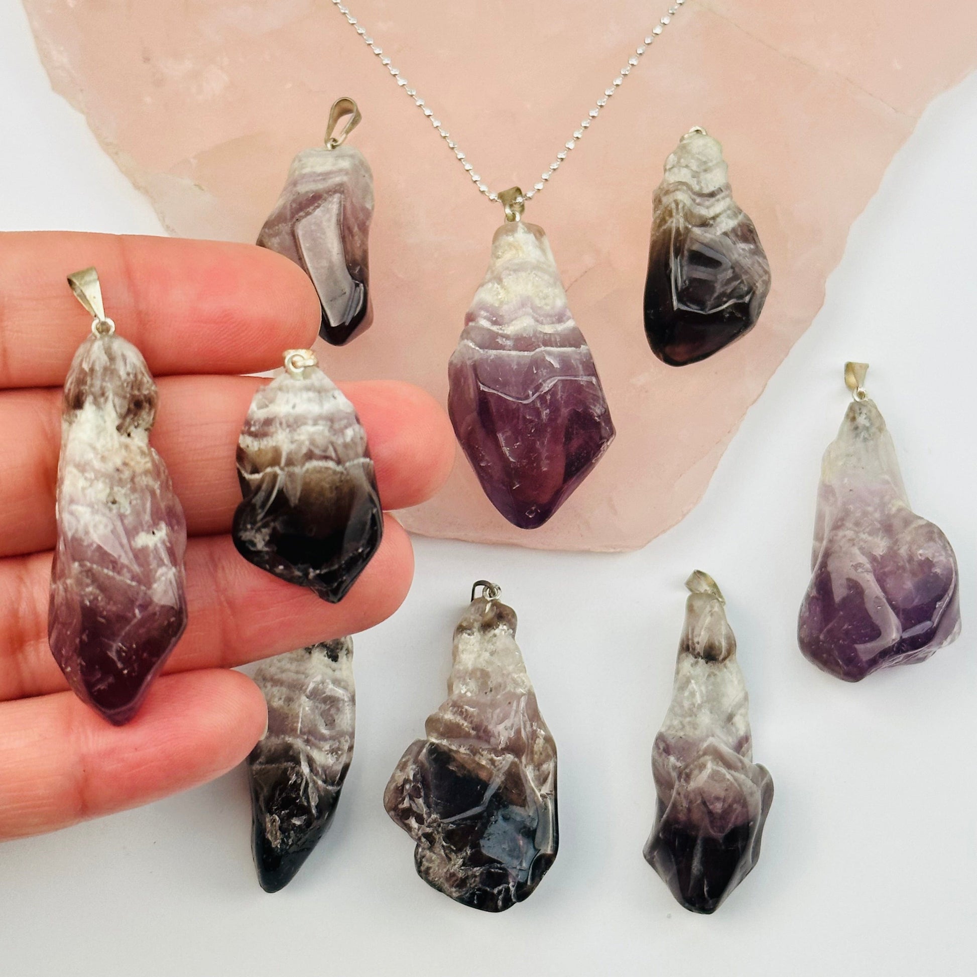 Chevron Amethyst Crystal Polished Point Pendant Charm - Silver Bail in hand for size reference 