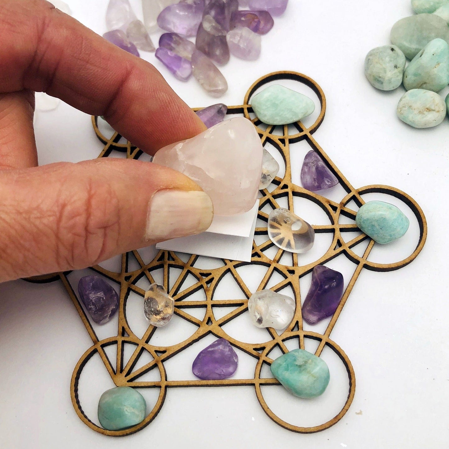 Love Crystal Grid Set showing placing stones on grid
