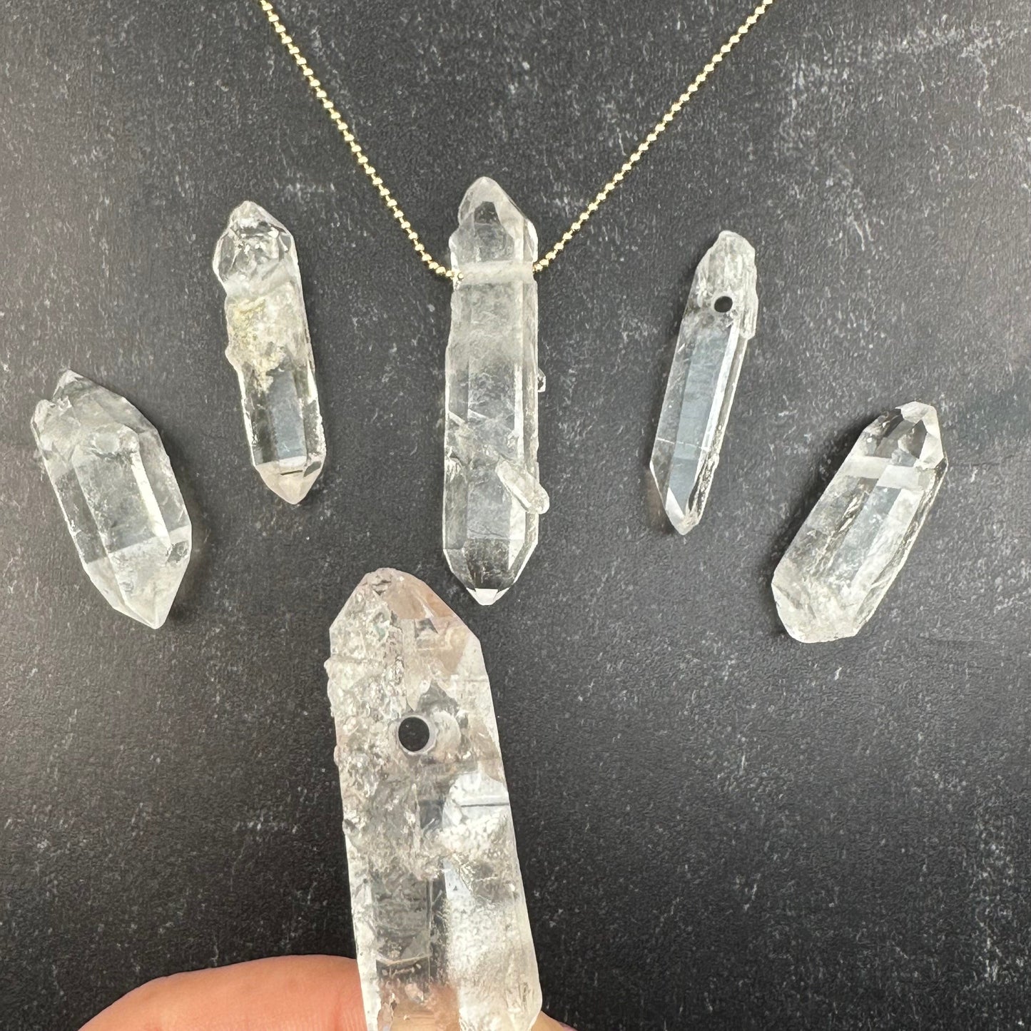 close up of the drill hole on the pendant 