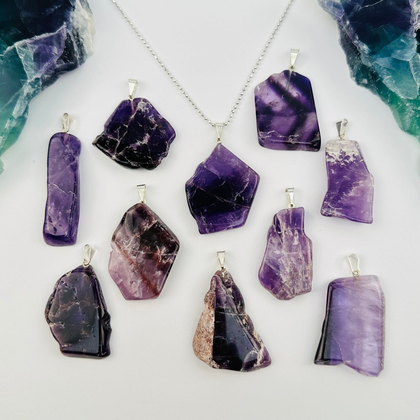 multiple pendants displayed to show the differences in the sizes and color shades 
