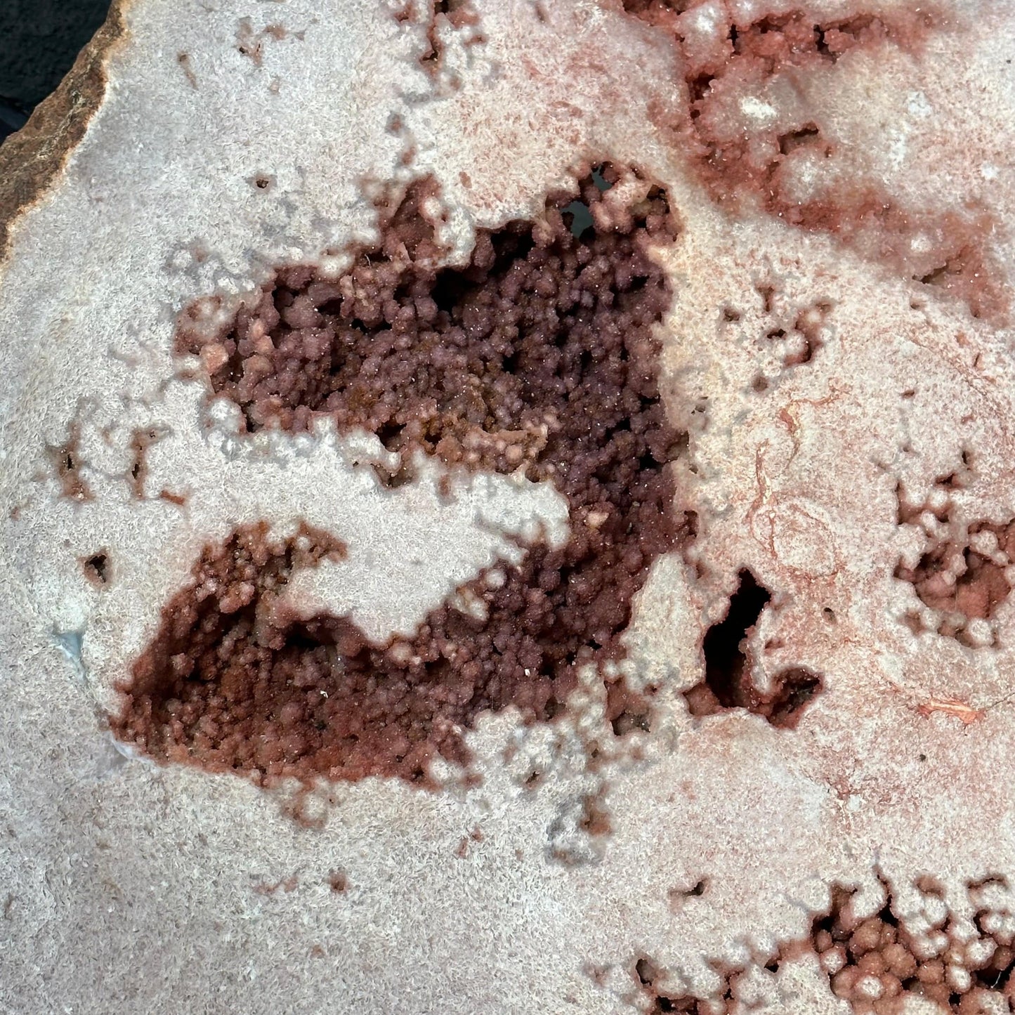 close up of the pink amethyst druzy on the table
