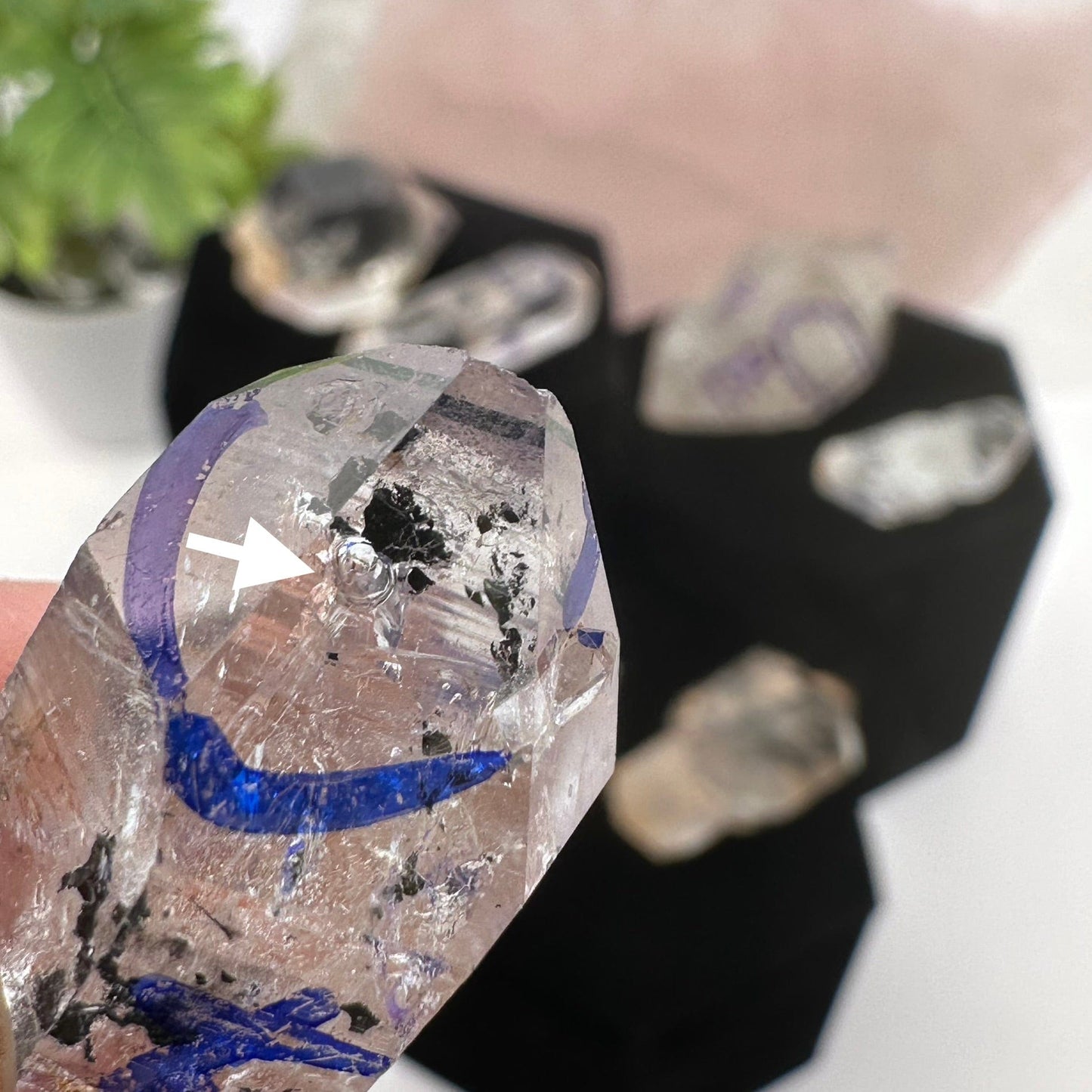 close up of this water bubble that has been trapped within this crystal