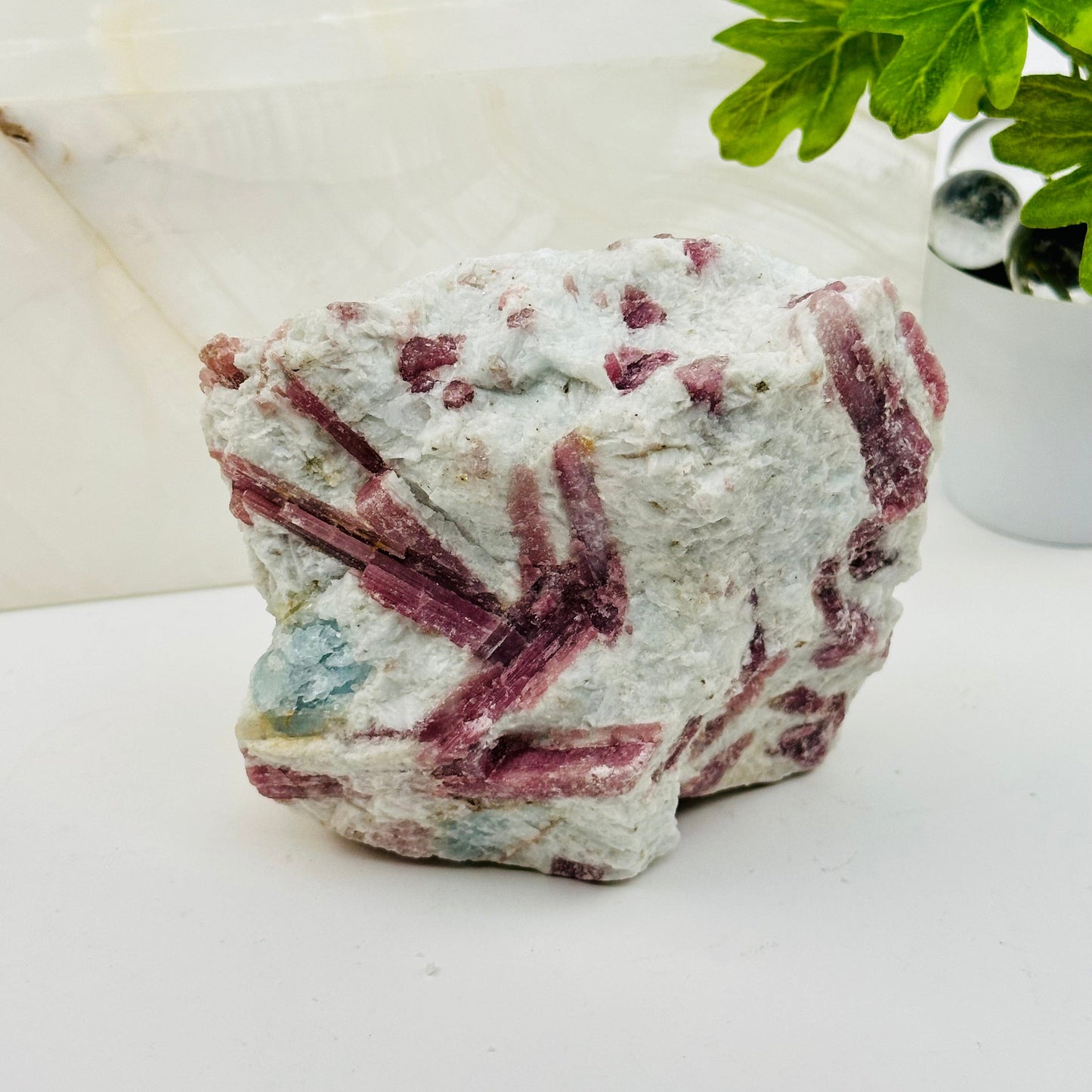 pink tourmaline crystal cluster displayed as home decor