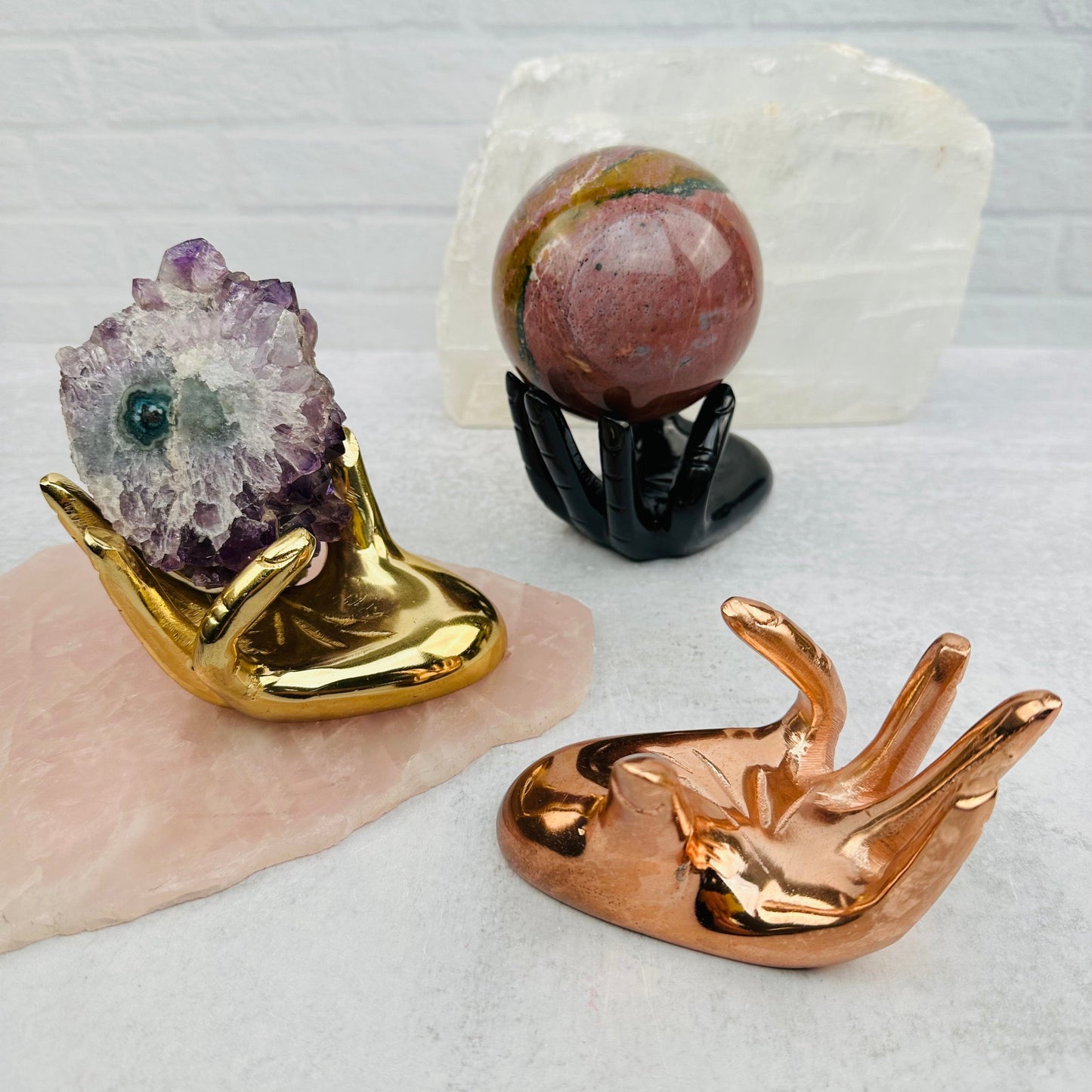 multiple crystal holders displayed to show the differences in the color tones 